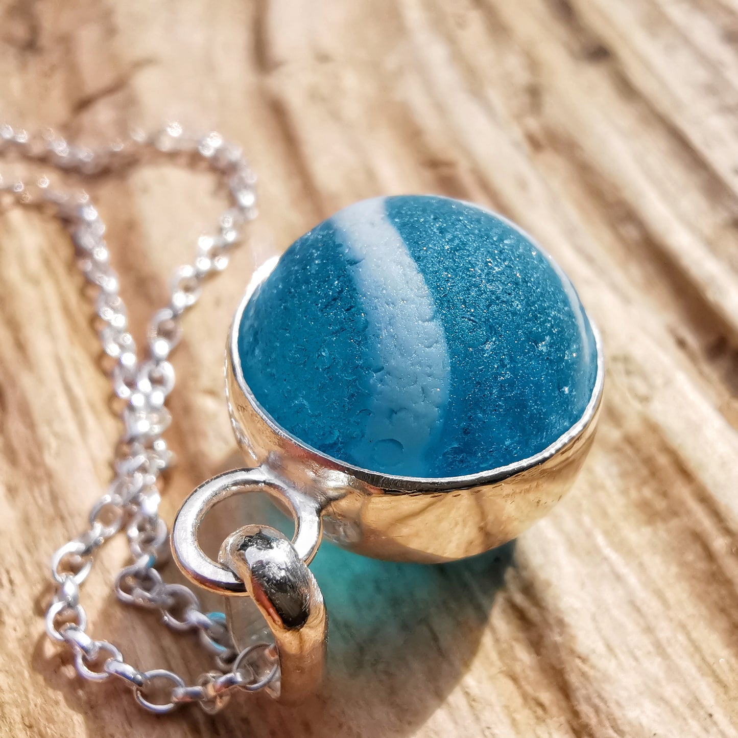 Aqua blue sea glass marble & sterling silver pendant.
