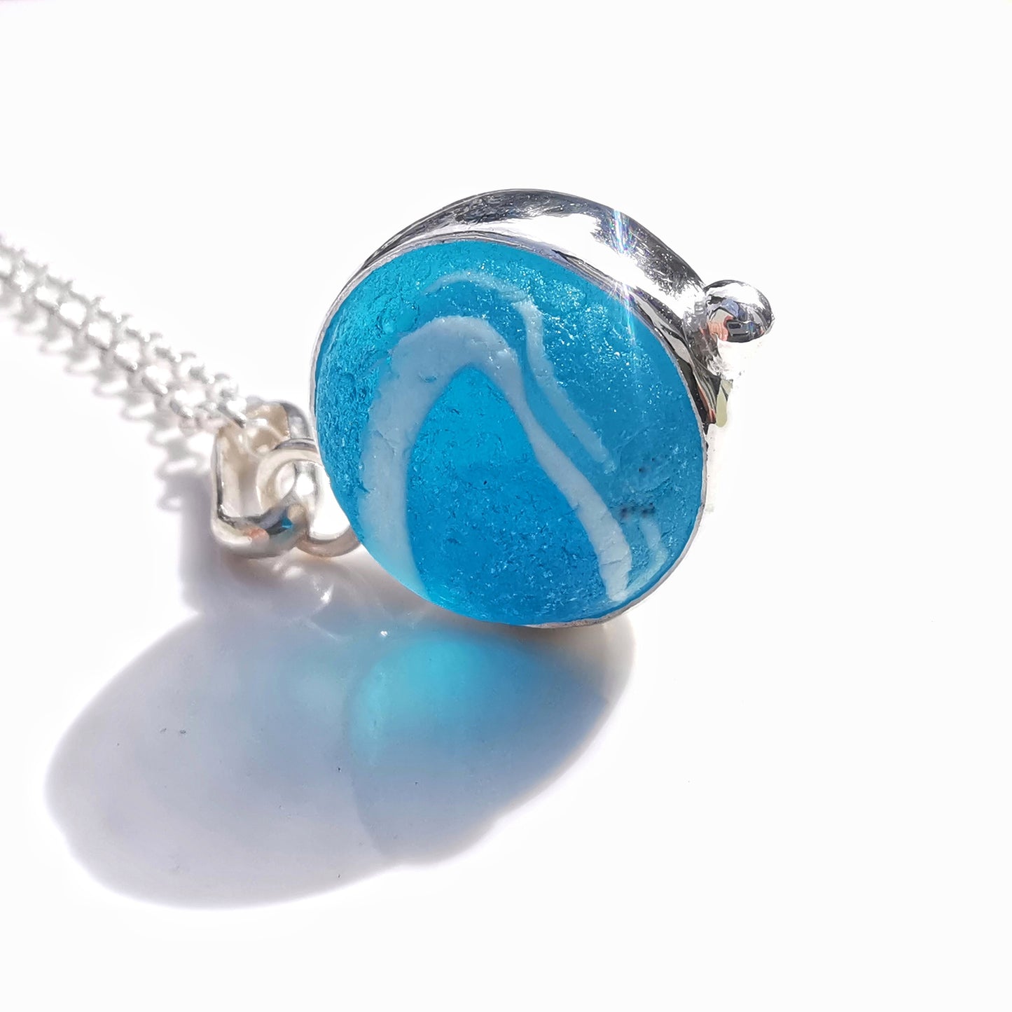 Aqua blue sea glass marble & sterling silver pendant.