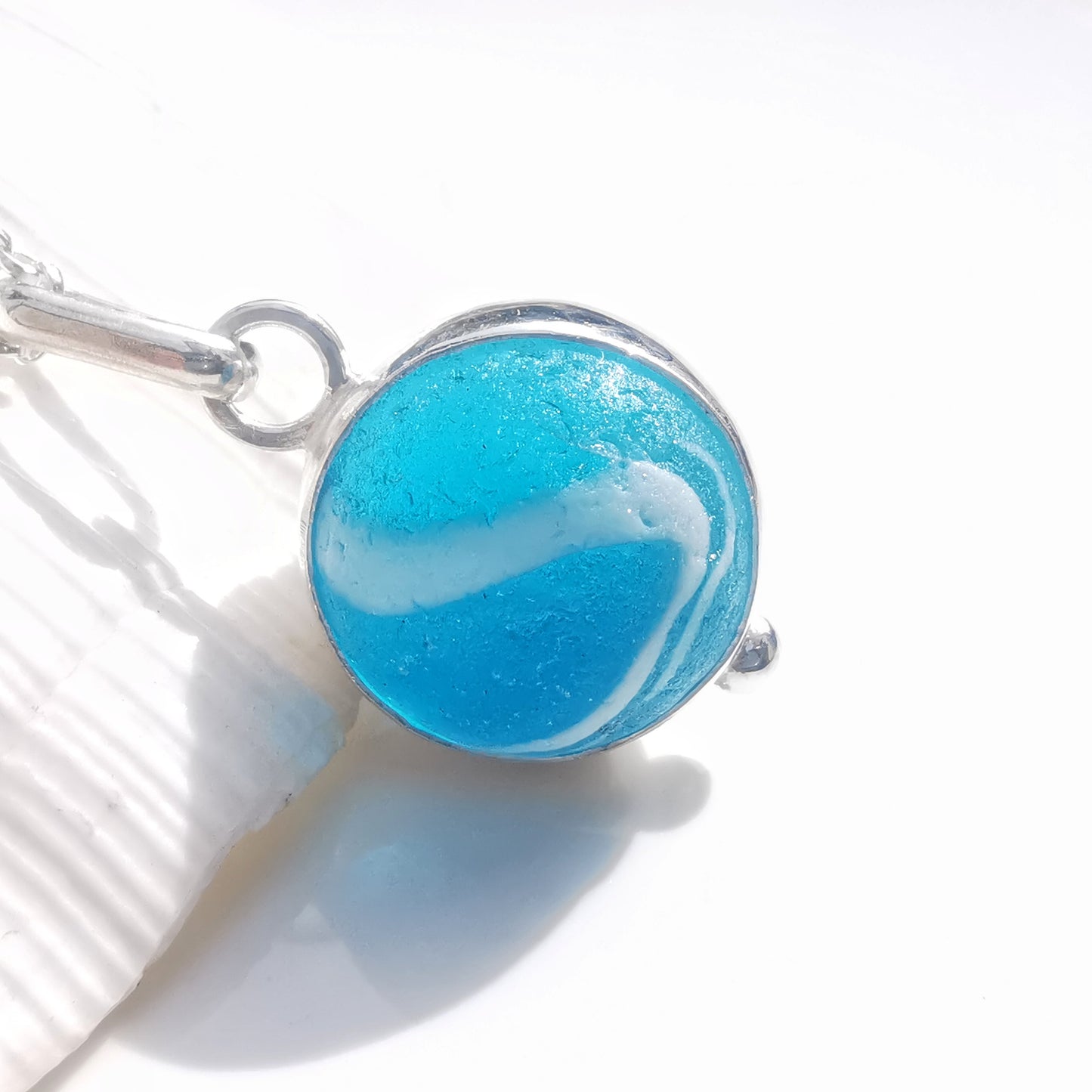 Aqua blue sea glass marble & sterling silver pendant.