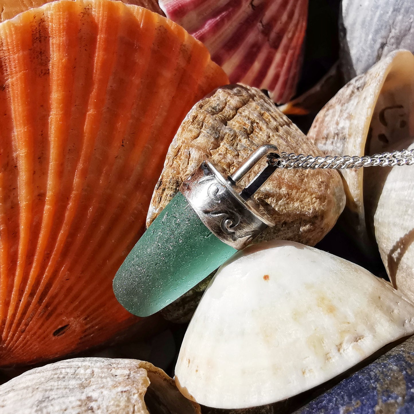 Scottish teal sea glass stopper stem & sterling silver pendant.