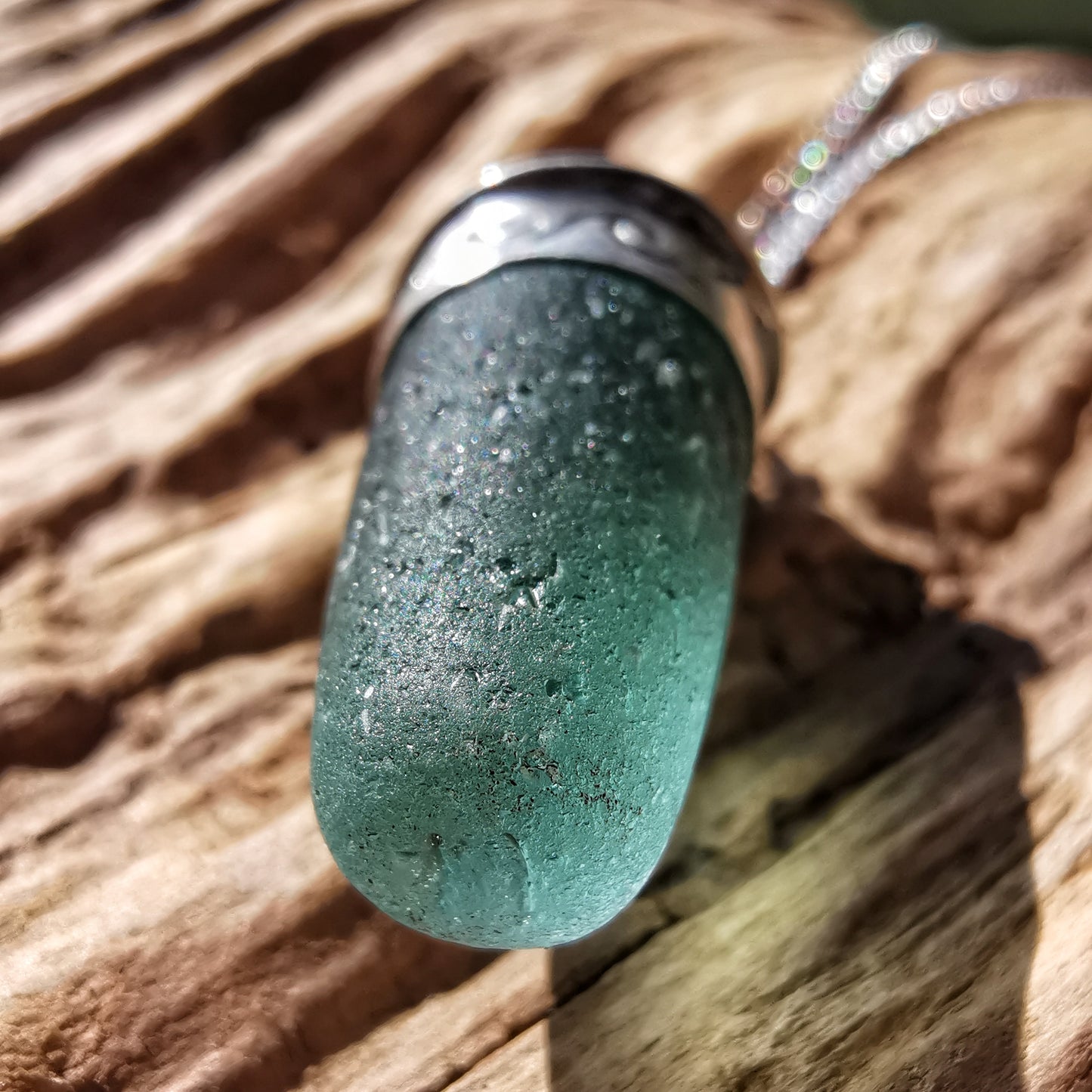 Scottish teal sea glass stopper stem & sterling silver pendant.