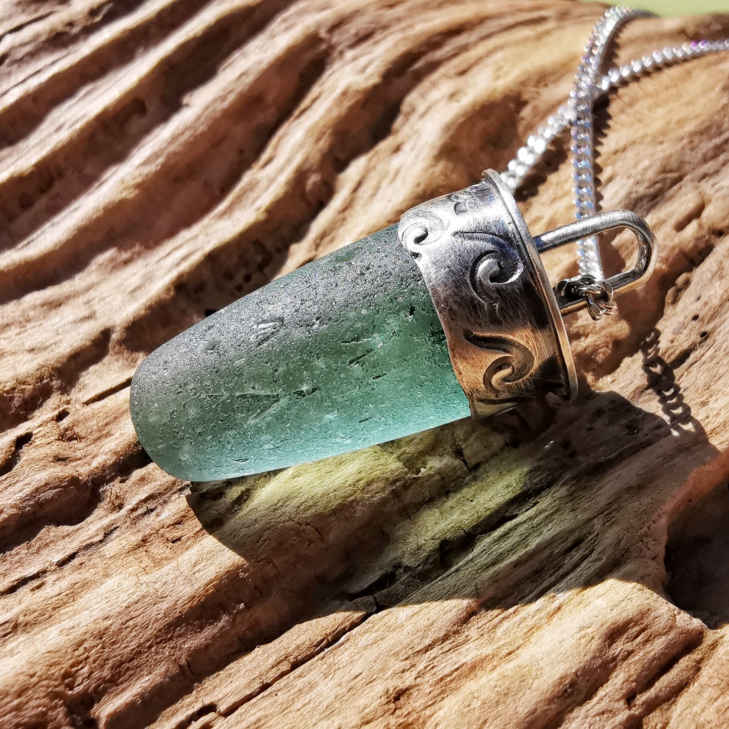 Scottish teal sea glass stopper stem & sterling silver pendant.