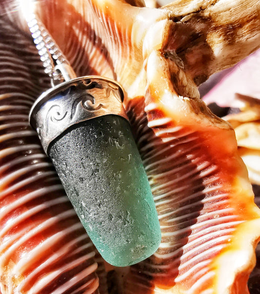 Scottish teal sea glass stopper stem & sterling silver pendant.