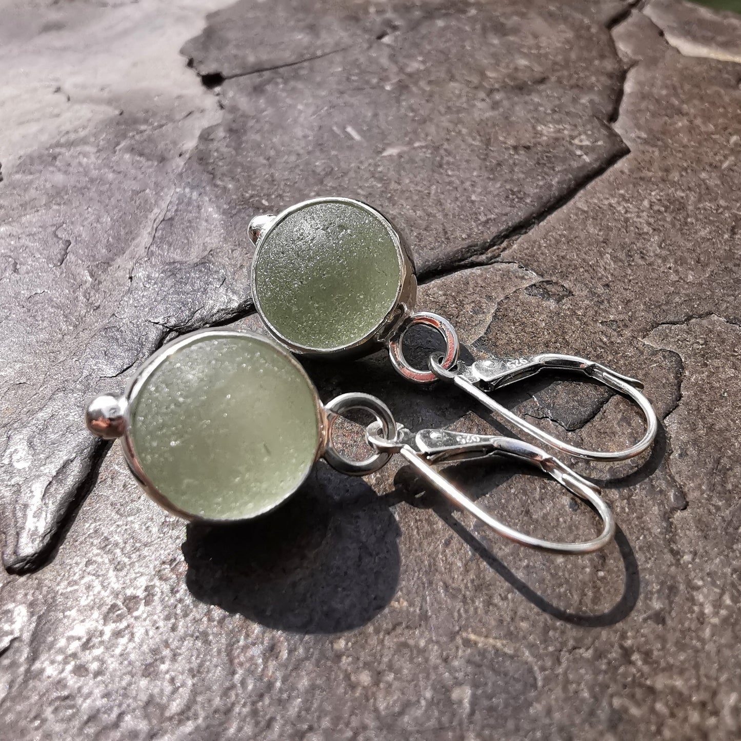 Genuine Scottish green sea glass marbles and sterling silver earrings.