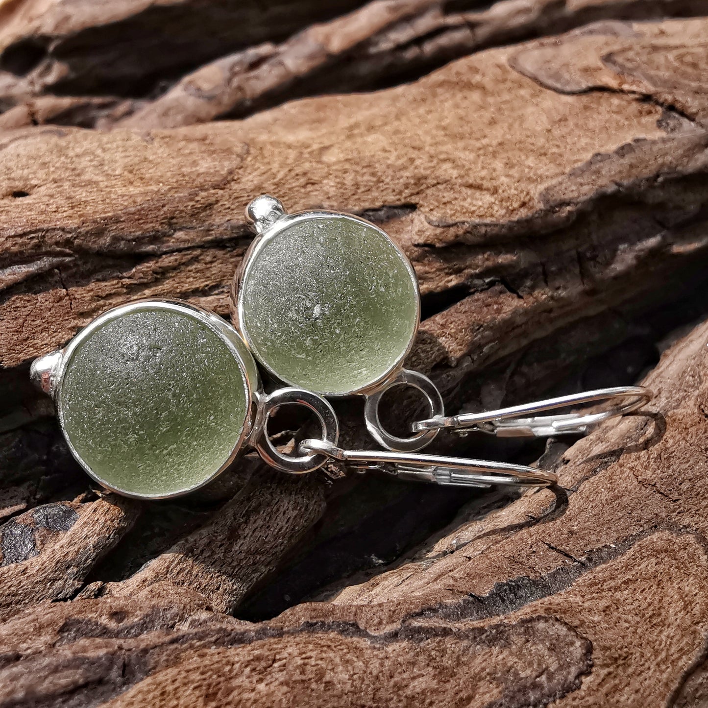 Genuine Scottish green sea glass marbles and sterling silver earrings.