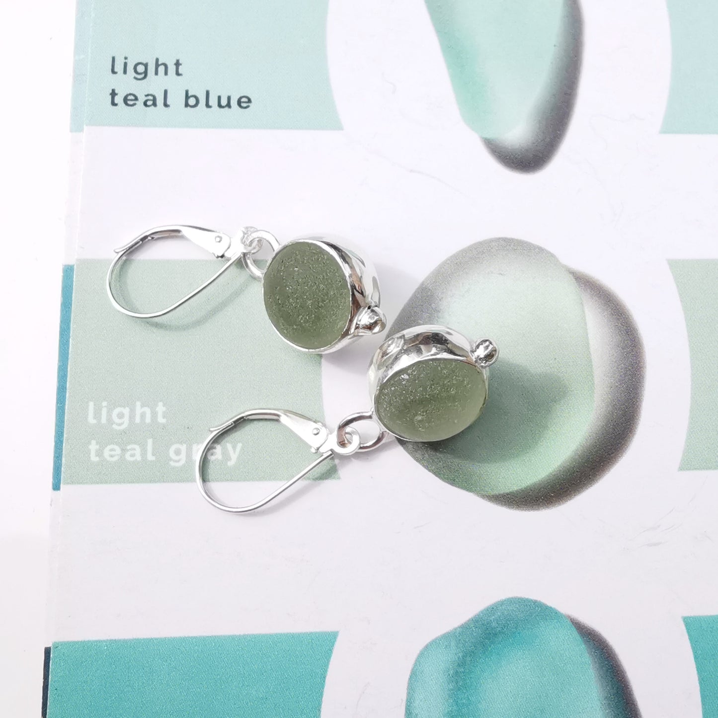 Genuine Scottish green sea glass marbles and sterling silver earrings.