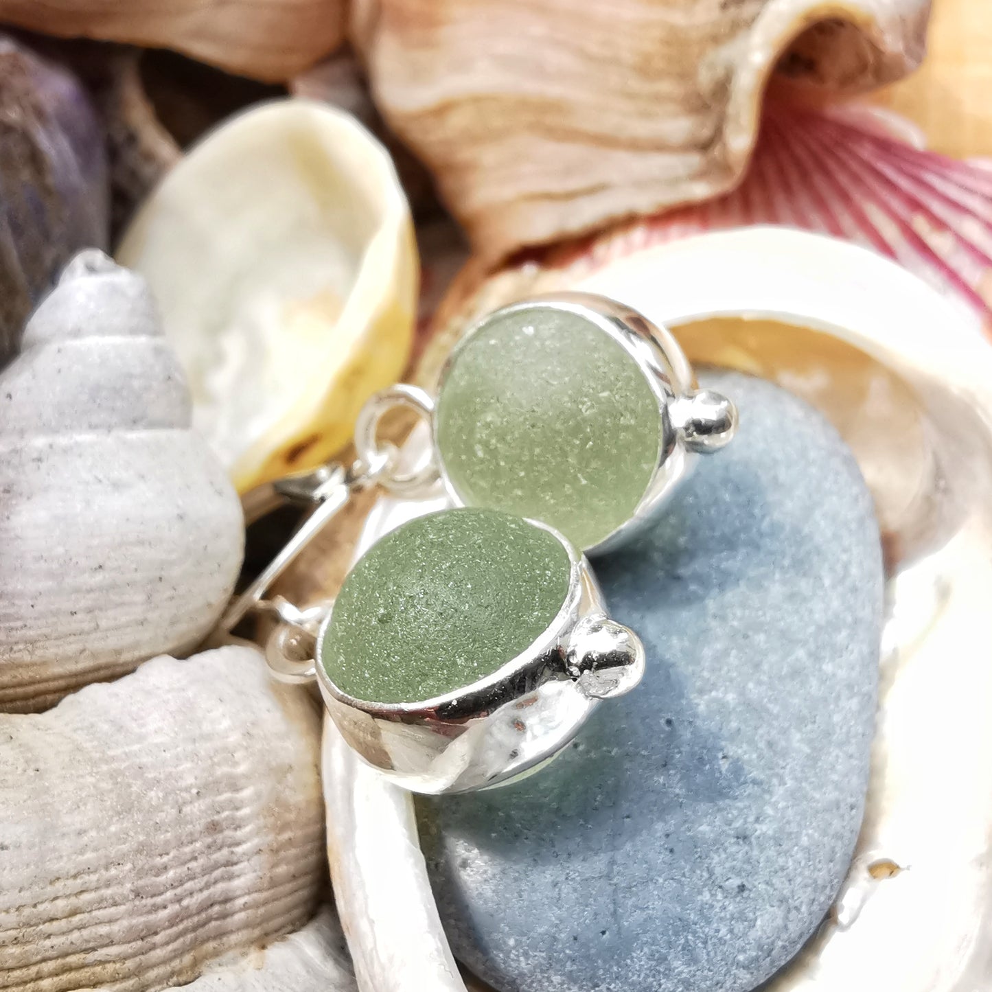 Genuine Scottish green sea glass marbles and sterling silver earrings.