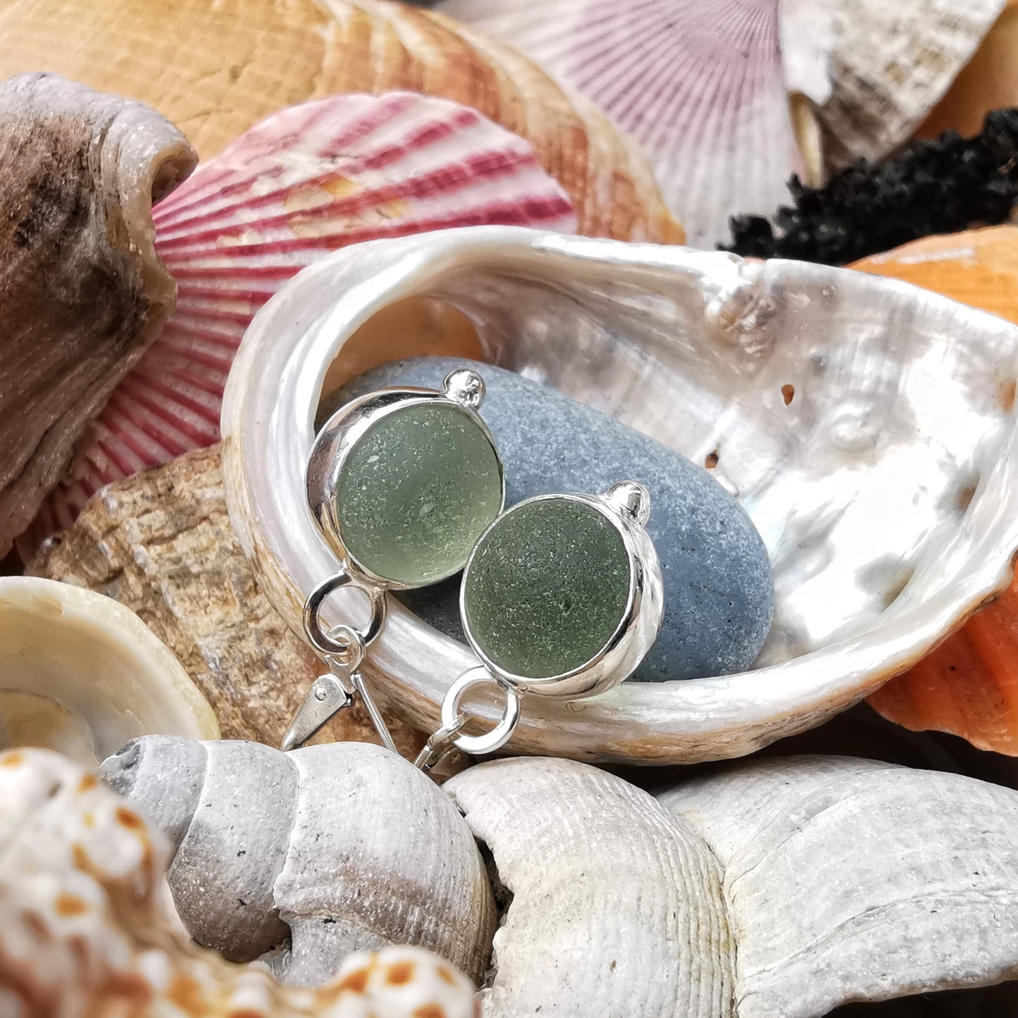 Genuine Scottish green sea glass marbles and sterling silver earrings.