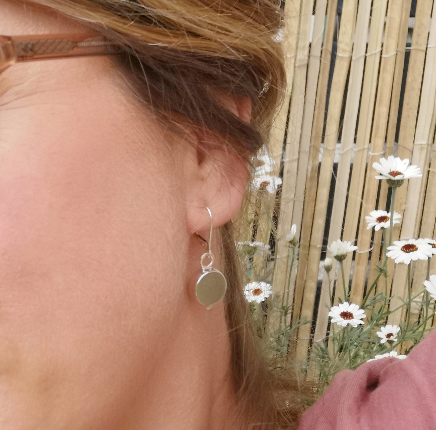 Genuine Scottish green sea glass marbles and sterling silver earrings.
