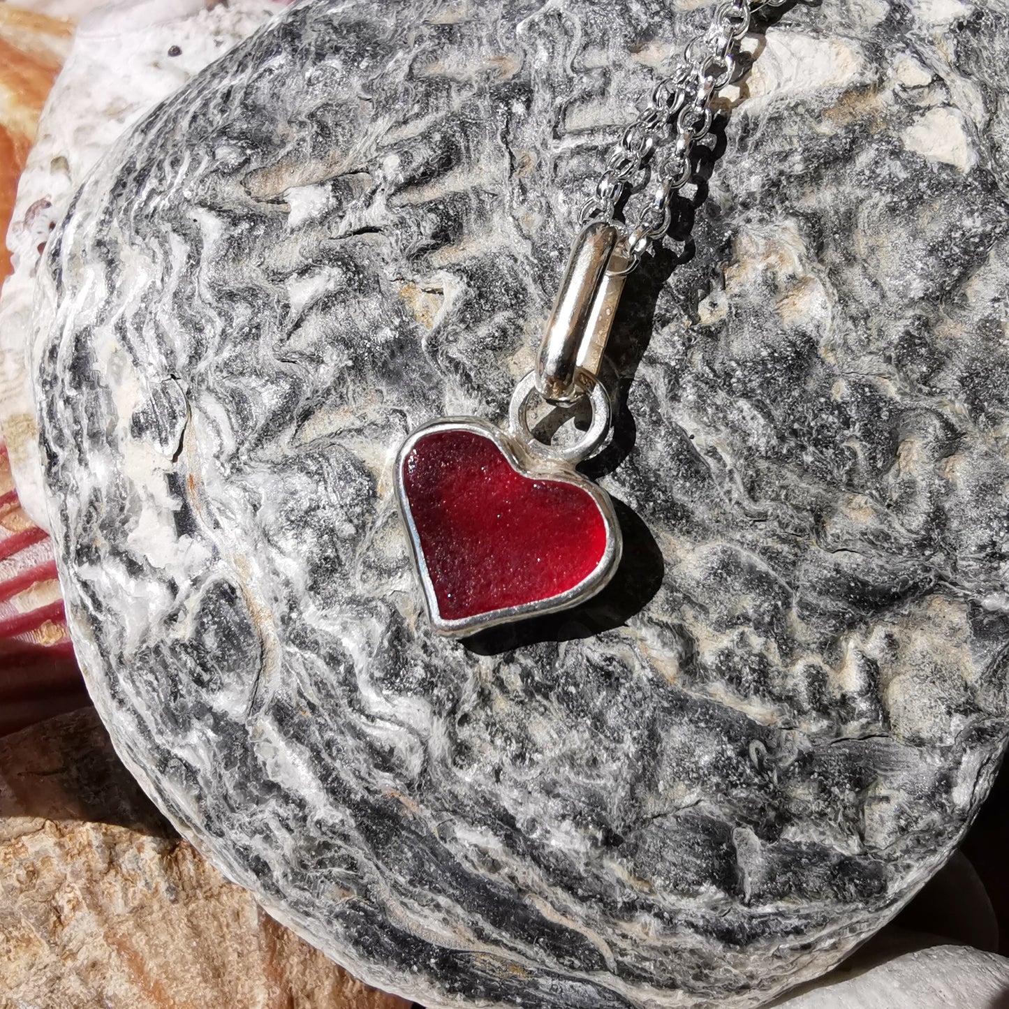 Scottish red sea glass heart & sterling silver pendant.