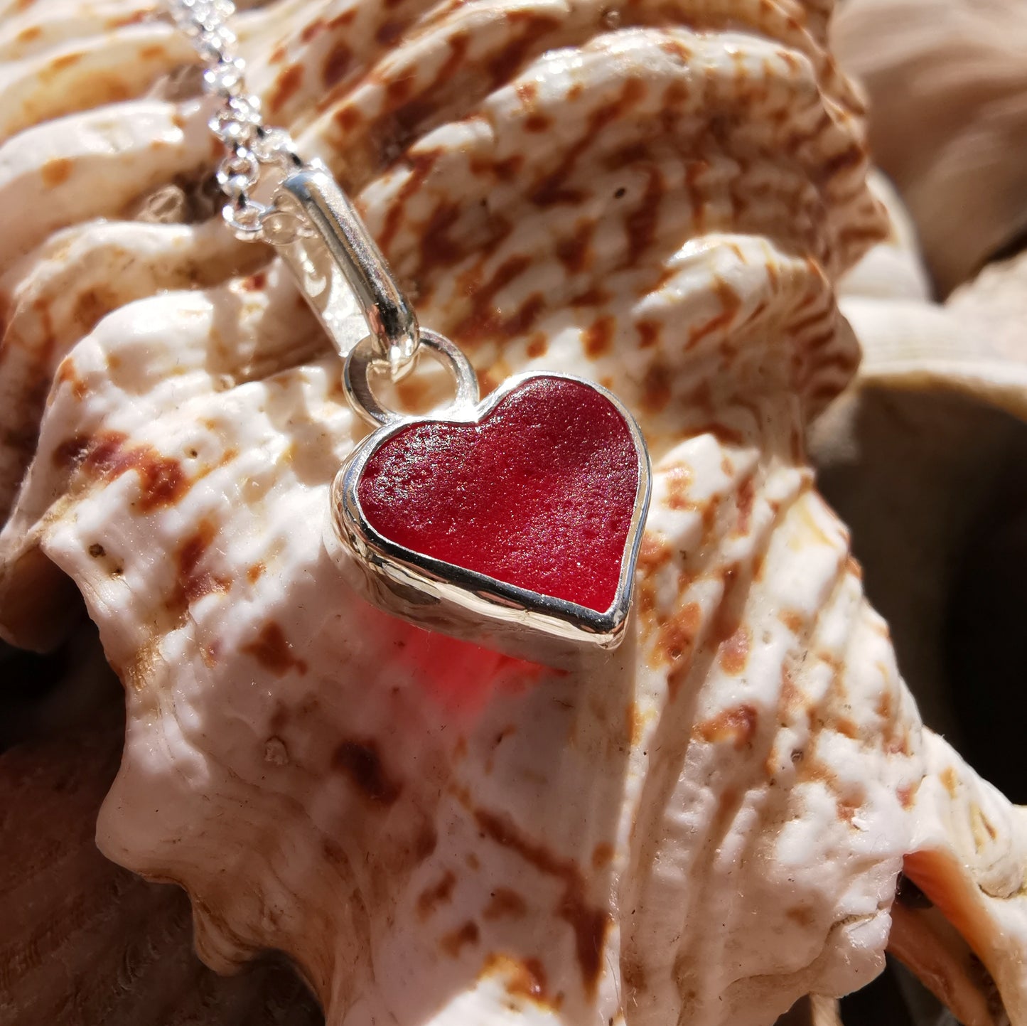 Scottish red sea glass heart & sterling silver pendant.