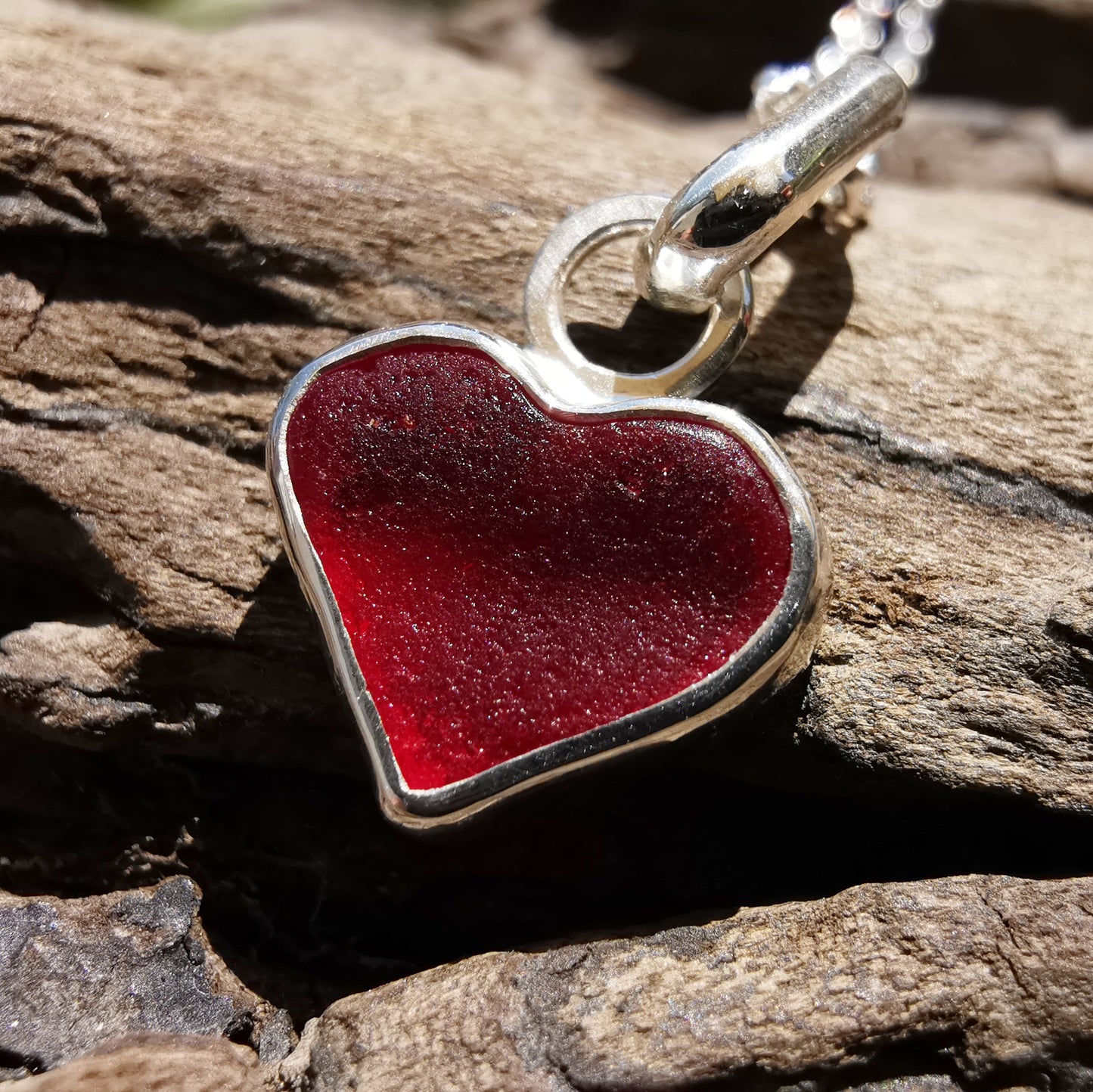Scottish red sea glass heart & sterling silver pendant.