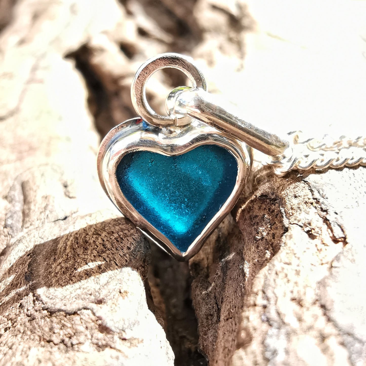 Tiny Scottish teal blue sea glass heart & sterling silver pendant.