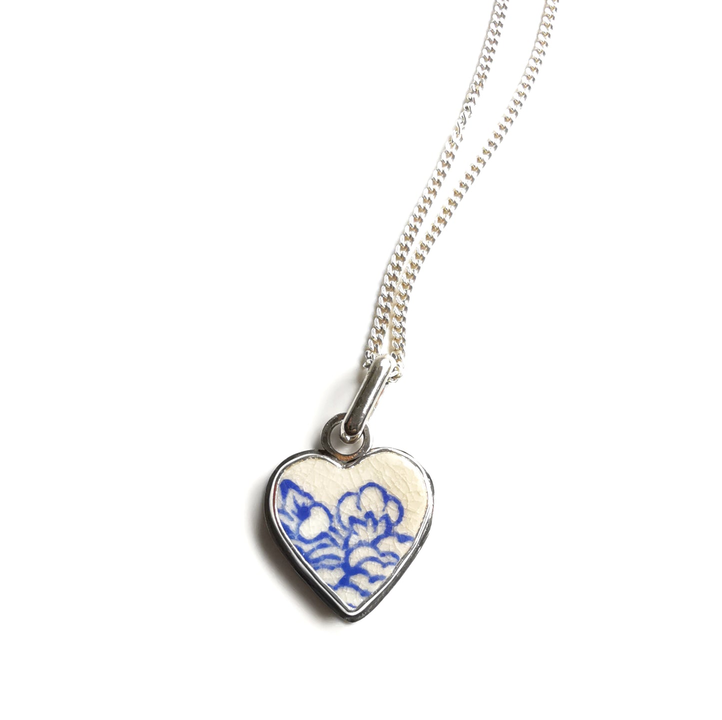Blue and white sea pottery heart & sterling silver pendant.