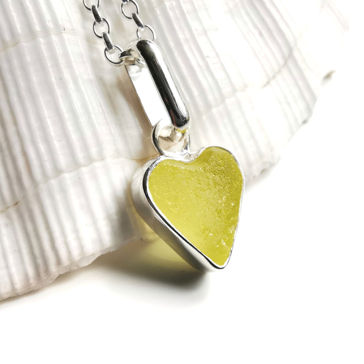 Scottish yellow UV sea glass & sterling silver heart pendant.