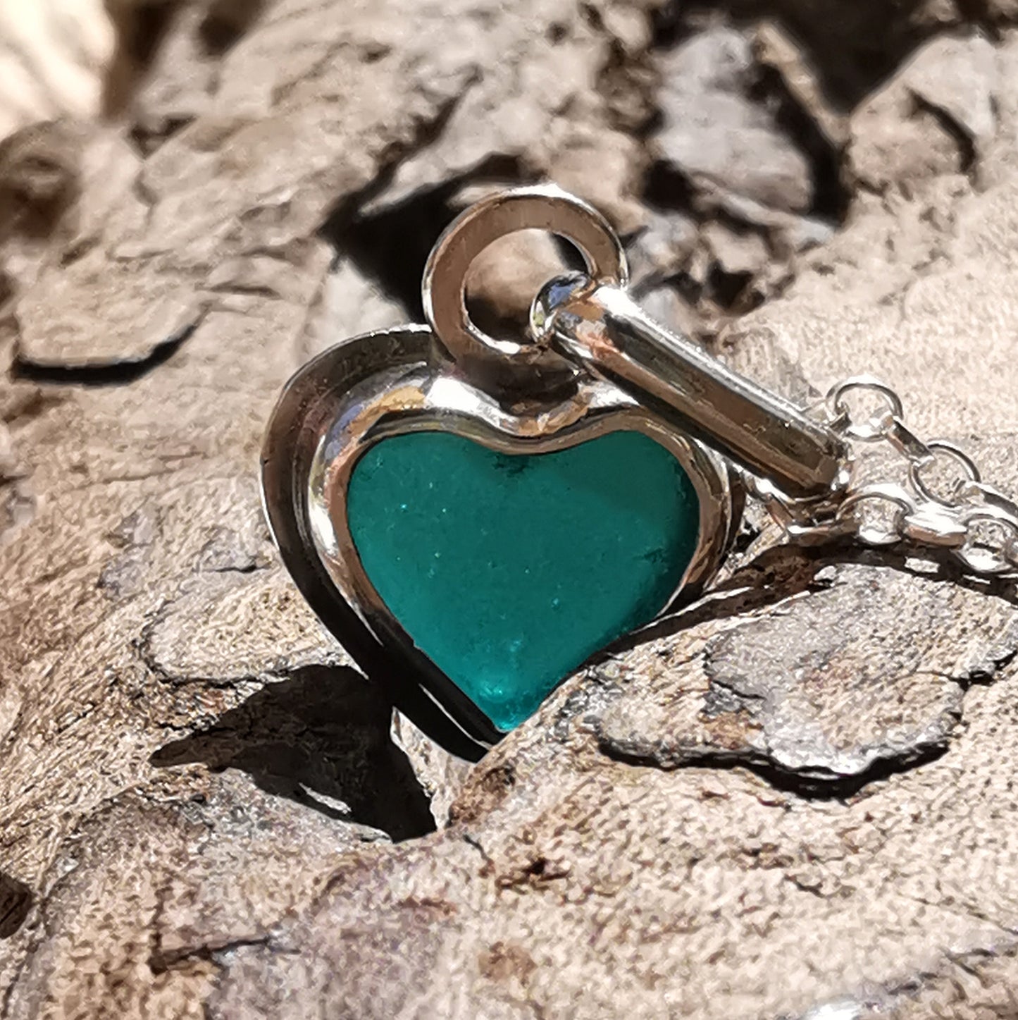 Scottish teal sea glass & sterling silver heart pendants.