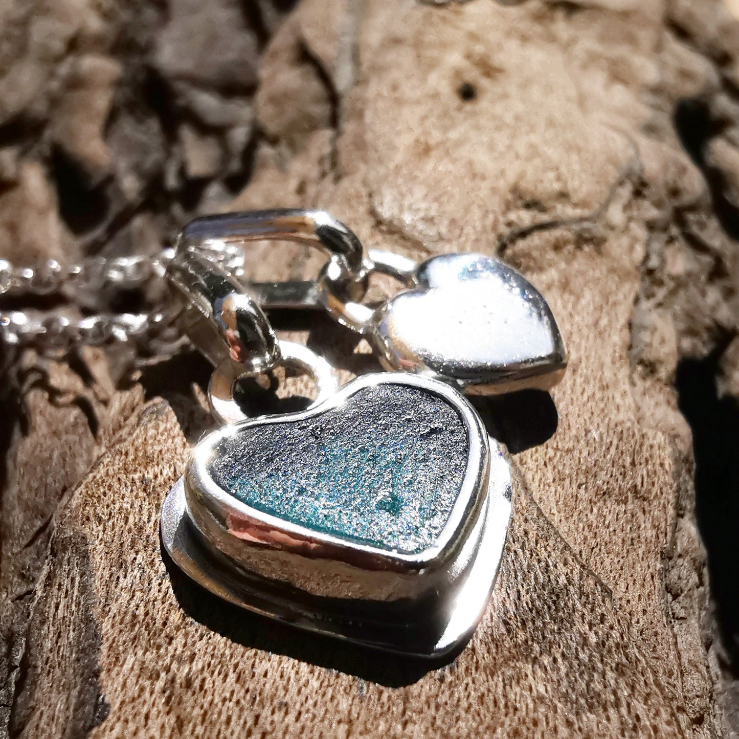 Scottish teal sea glass & sterling silver heart pendants.