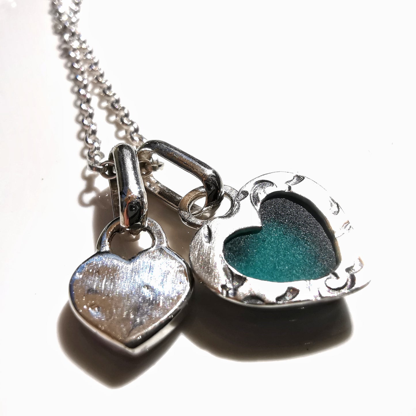 Scottish teal sea glass & sterling silver heart pendants.