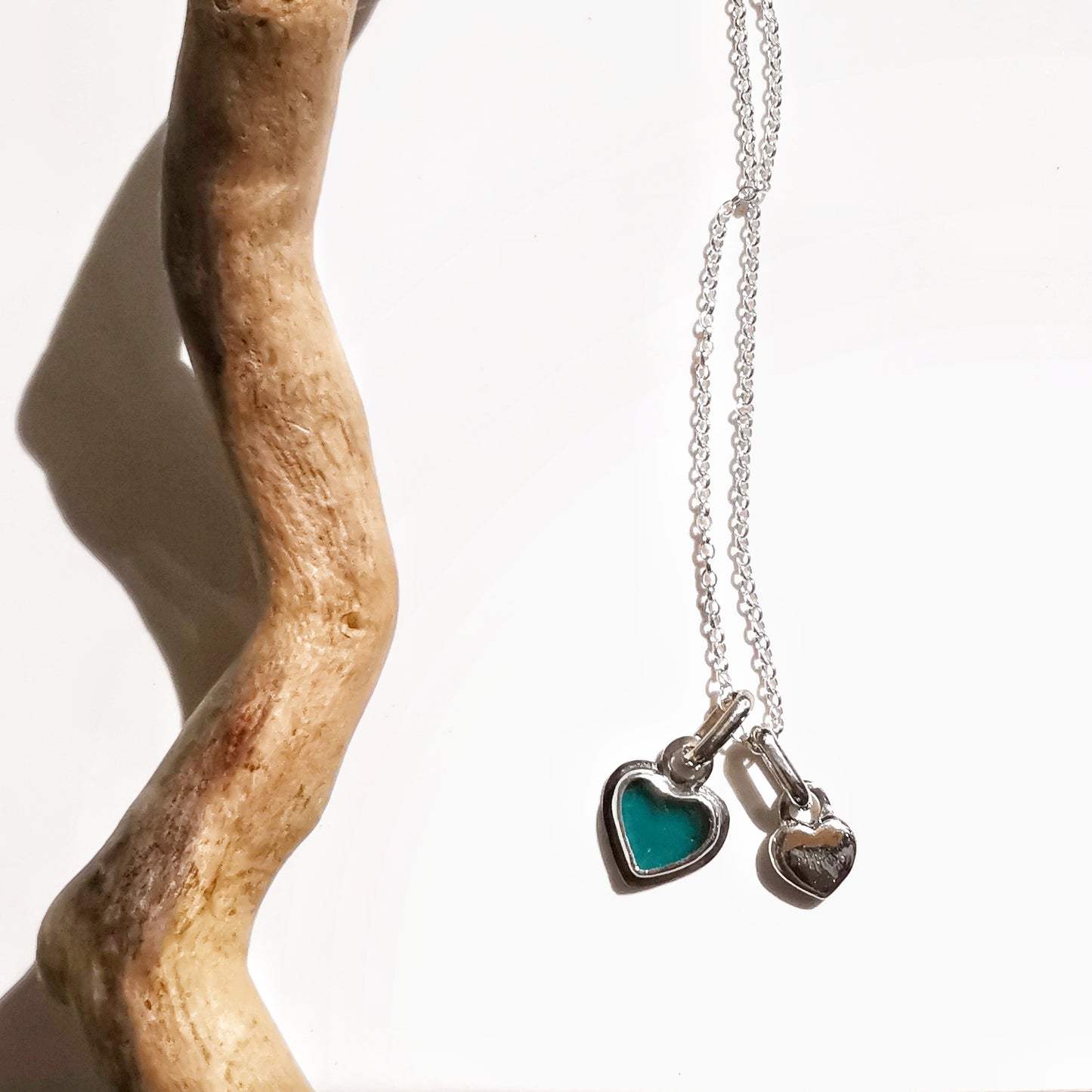Scottish teal sea glass & sterling silver heart pendants.