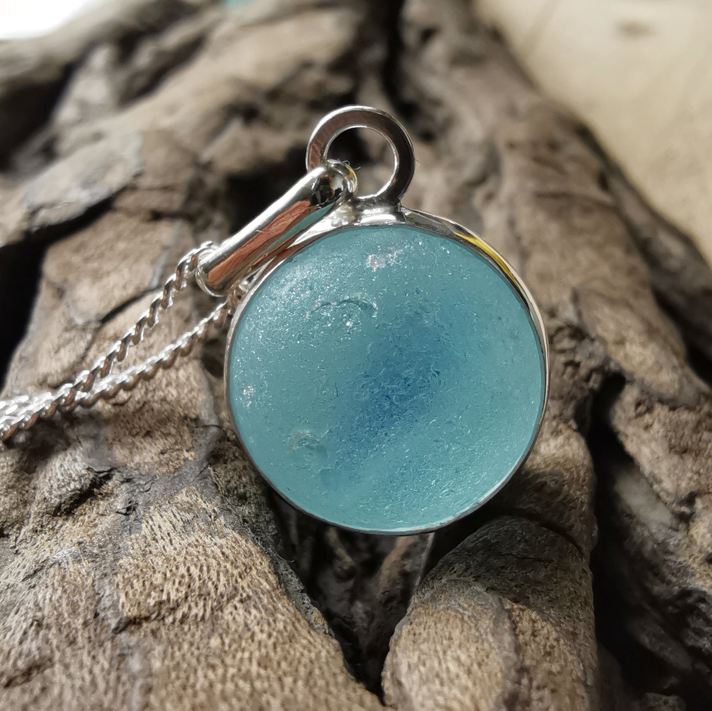 Aqua blue sea glass marble & sterling silver pendant.