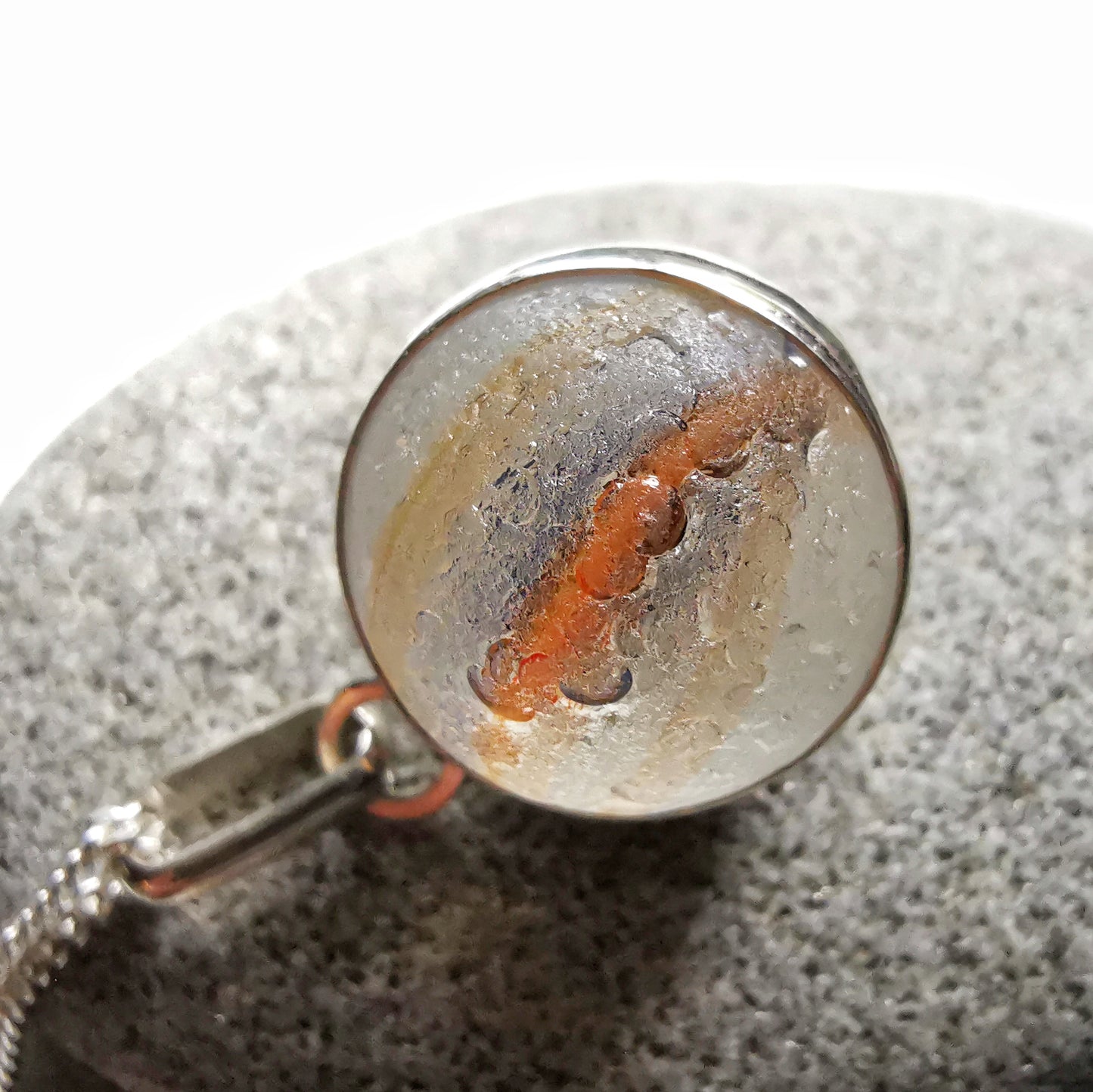 Scottish orange and blue sea glass marble & sterling silver pendant.