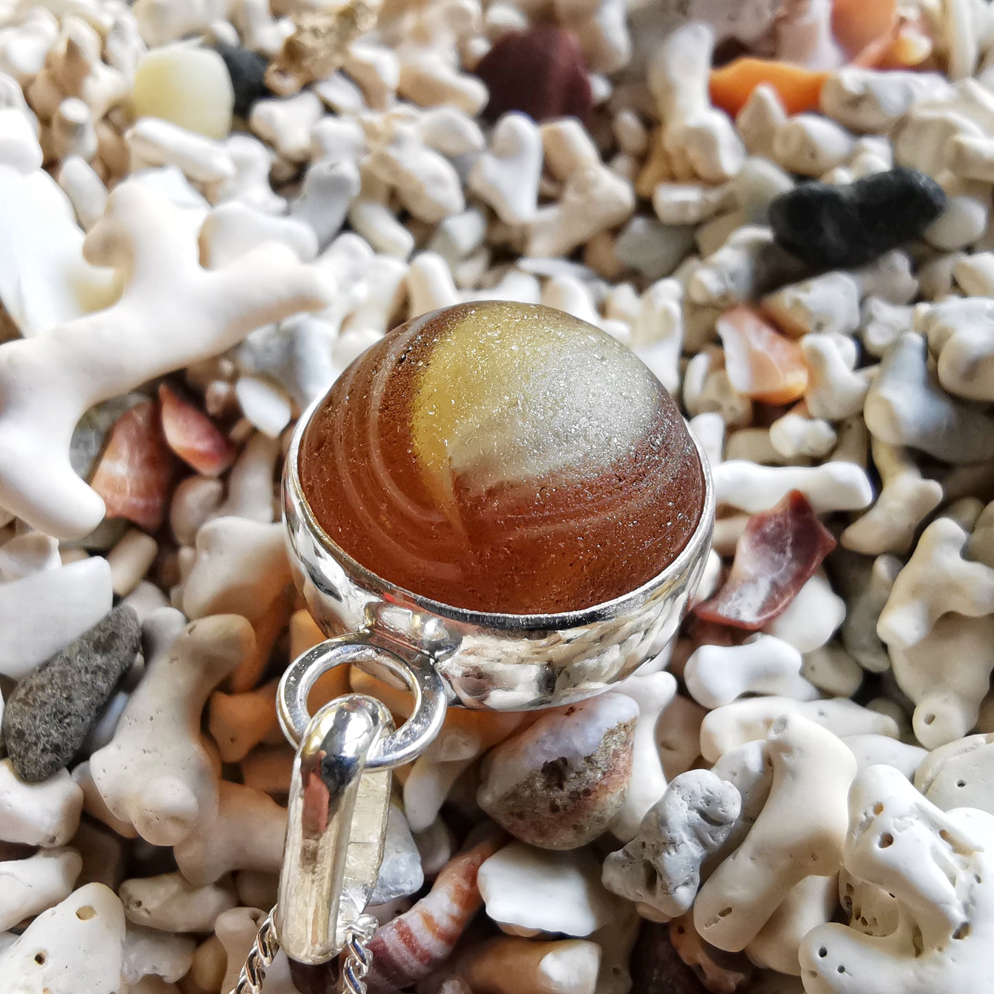 Genuine Scottish brown sea glass marble & sterling silver pendant.
