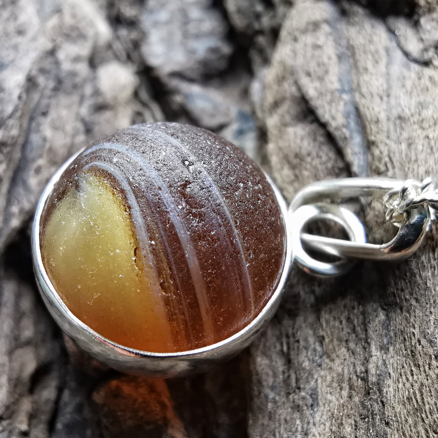Genuine Scottish brown sea glass marble & sterling silver pendant.