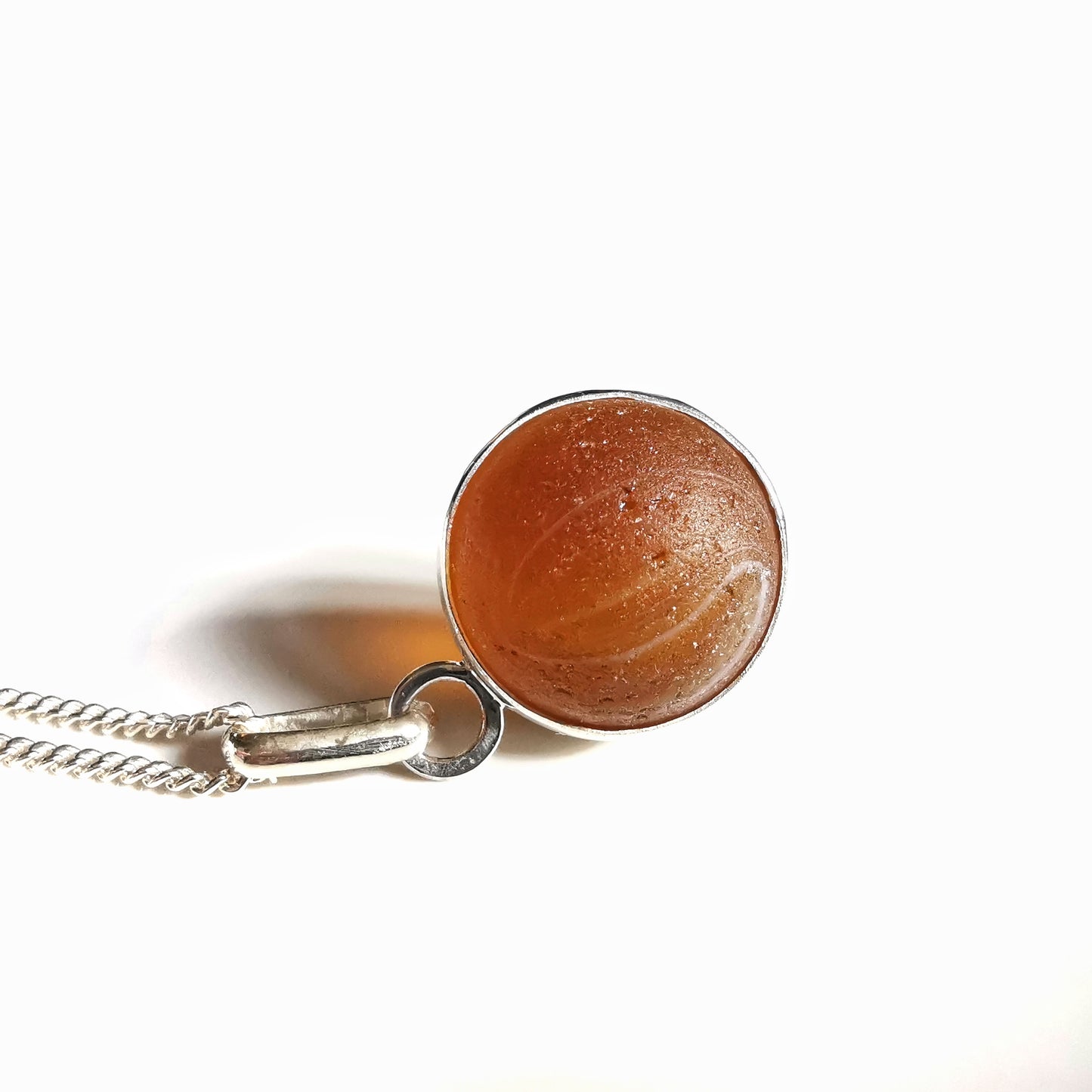 Genuine Scottish brown sea glass marble & sterling silver pendant.