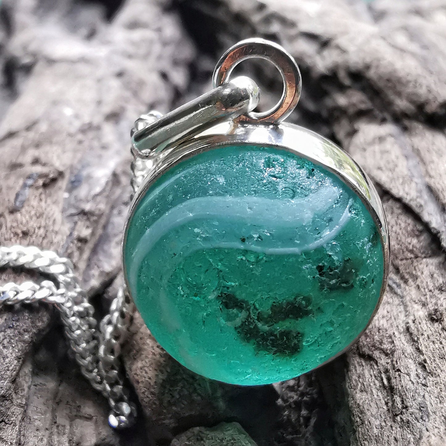 Scottish teal green sea glass marble & sterling silver pendant.