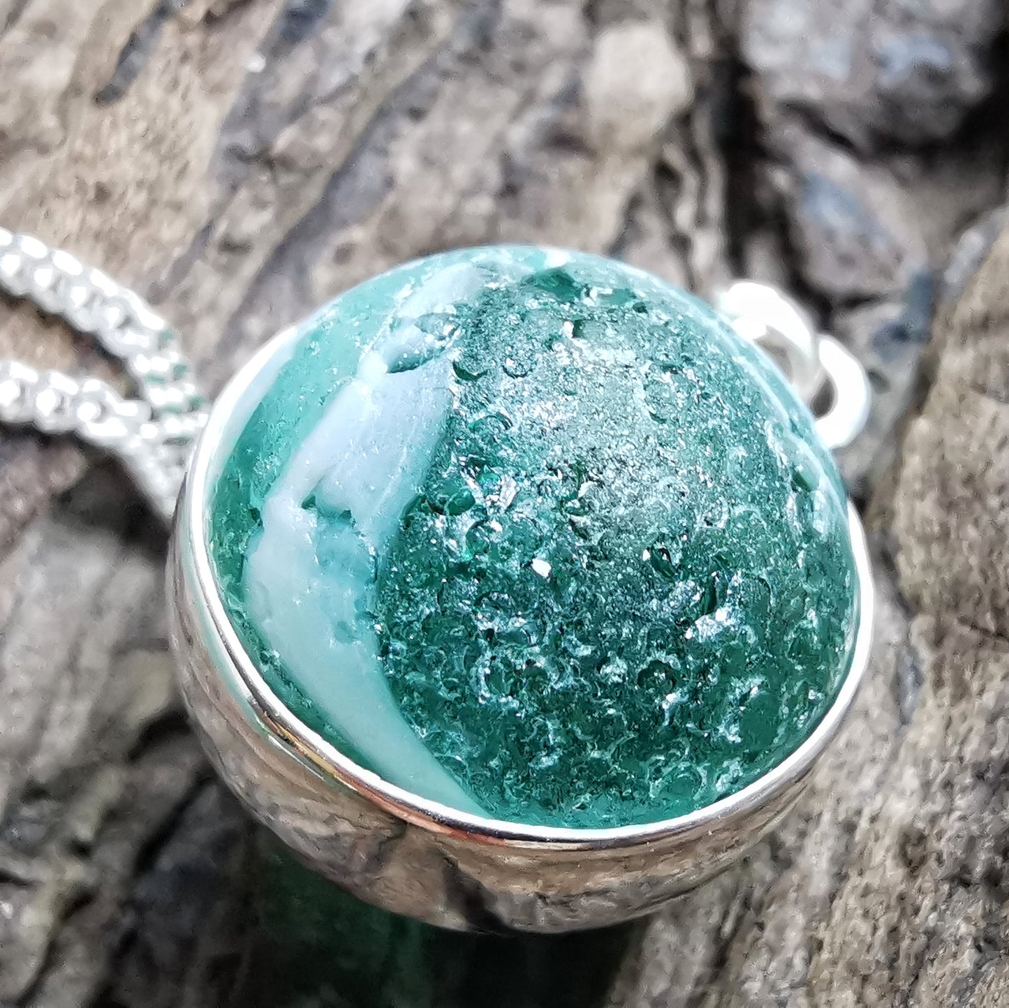 Scottish teal green sea glass marble & sterling silver pendant.
