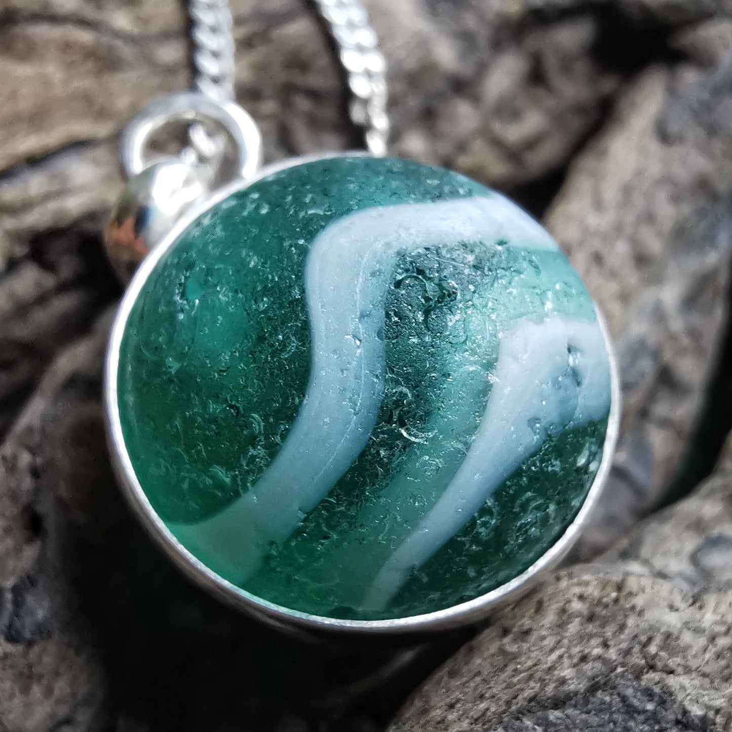 Scottish teal green sea glass marble & sterling silver pendant.