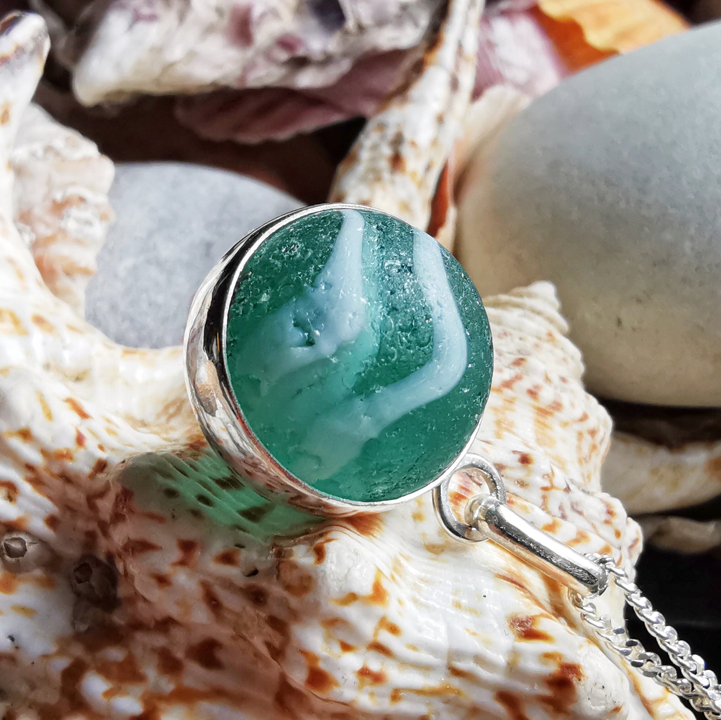 Scottish teal green sea glass marble & sterling silver pendant.