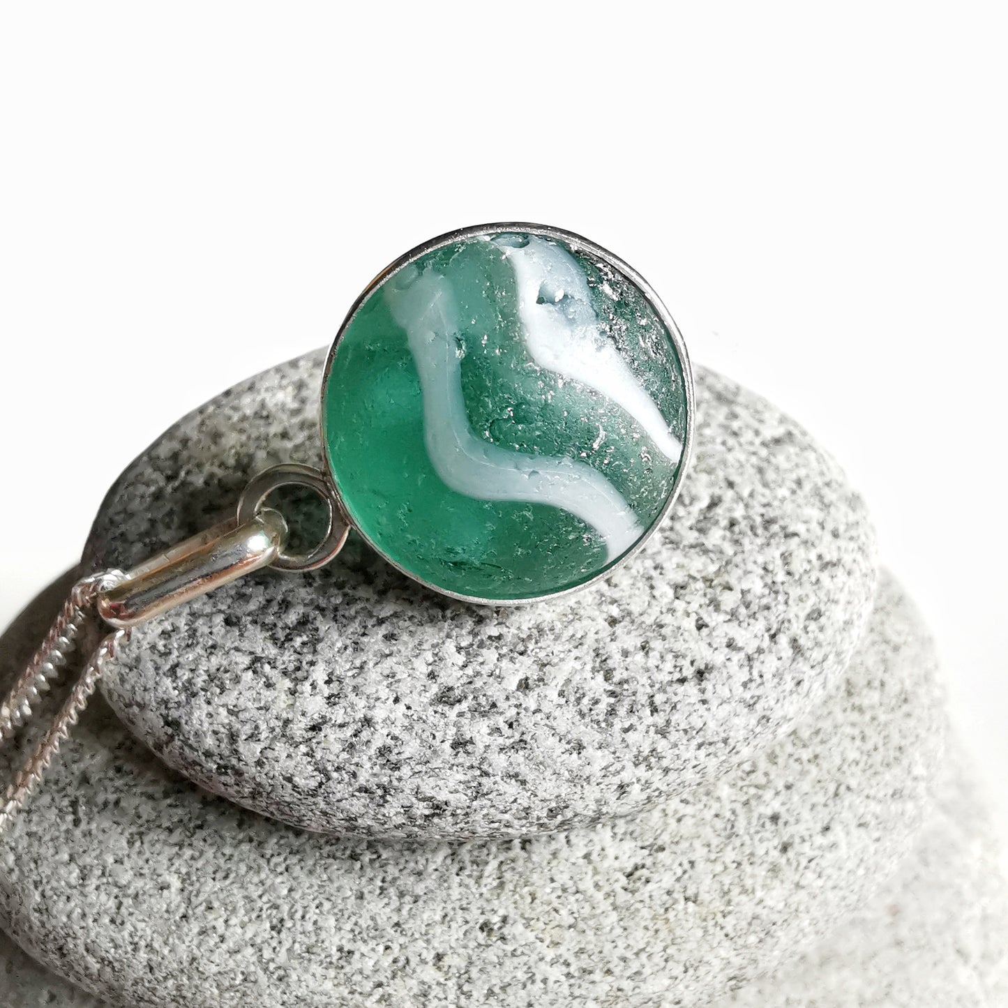 Scottish teal green sea glass marble & sterling silver pendant.