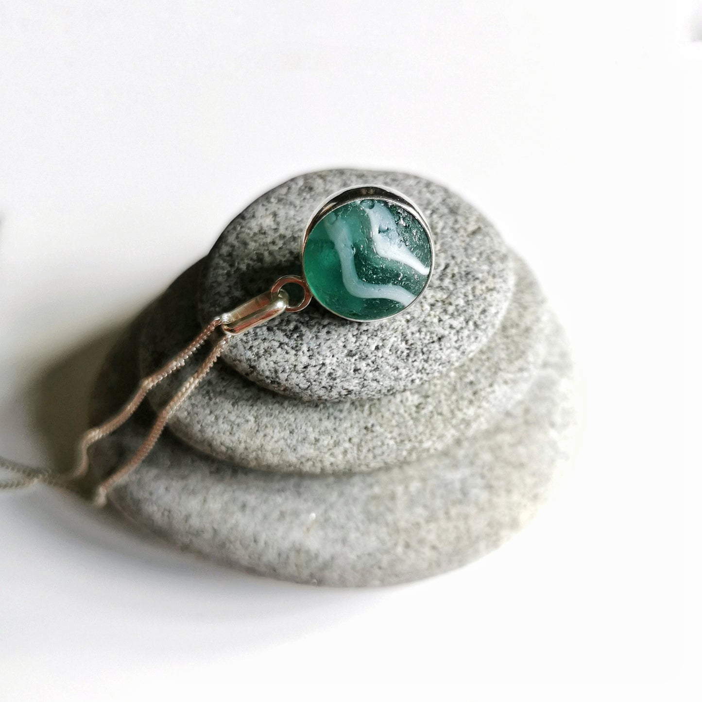 Scottish teal green sea glass marble & sterling silver pendant.