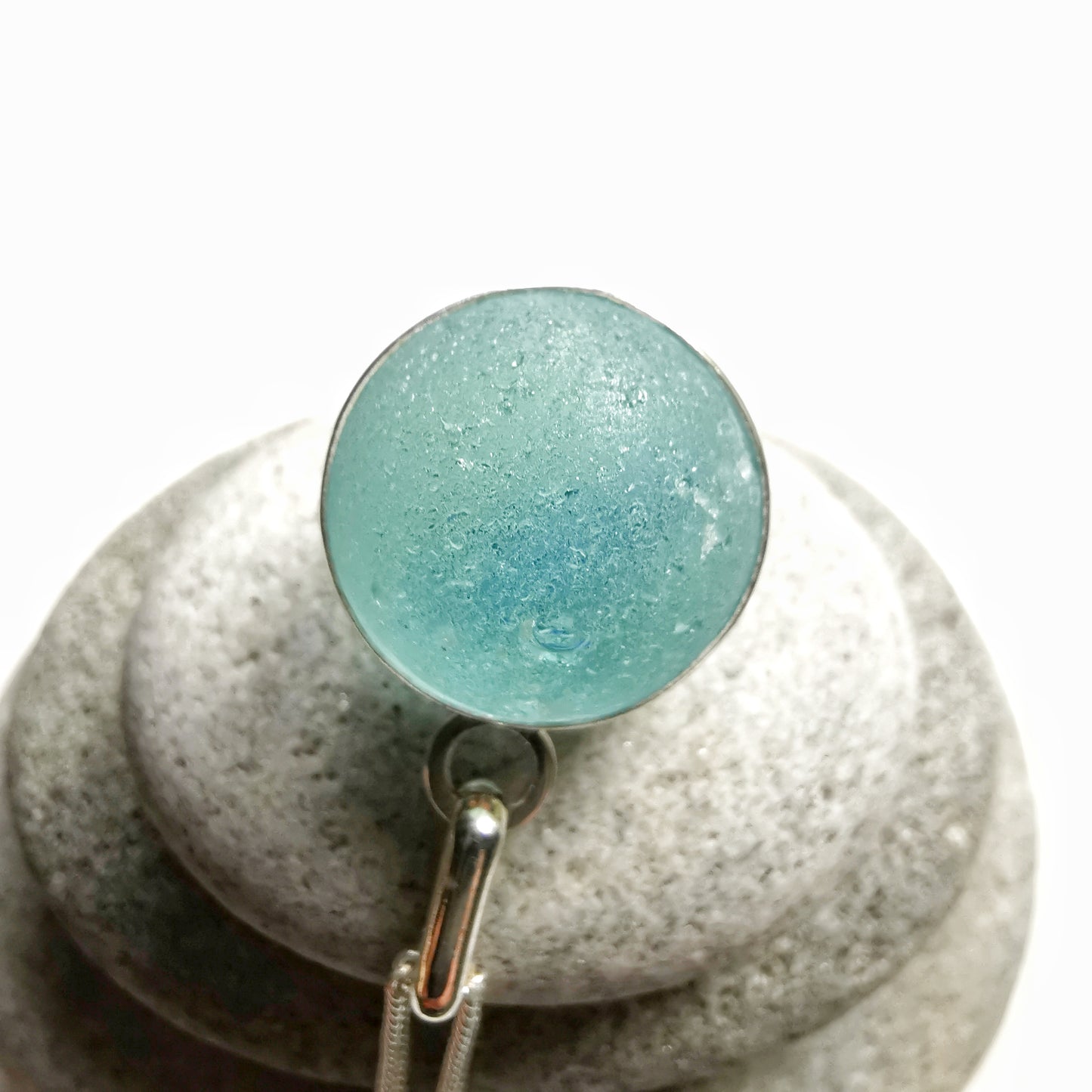Light blue sea glass marble & sterling silver pendant.