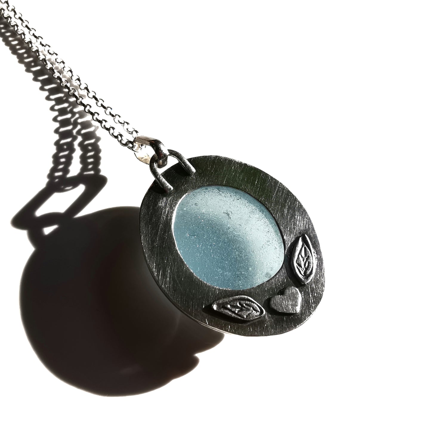 Scottish light blue sea glass & sterling silver pendant.