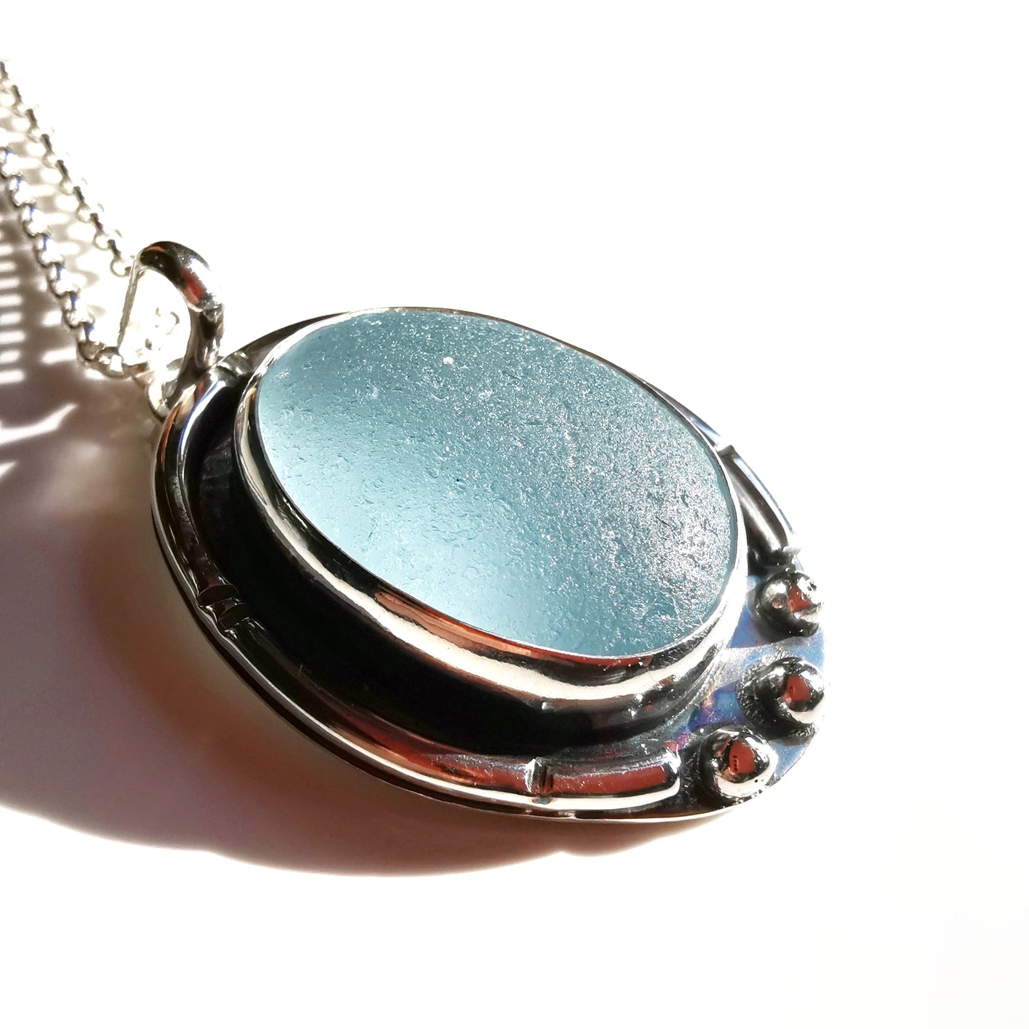 Scottish light blue sea glass & sterling silver pendant.