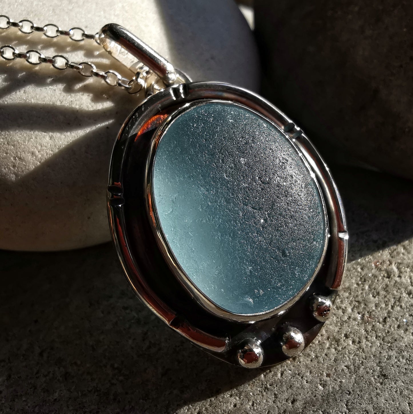 Scottish light blue sea glass & sterling silver pendant.