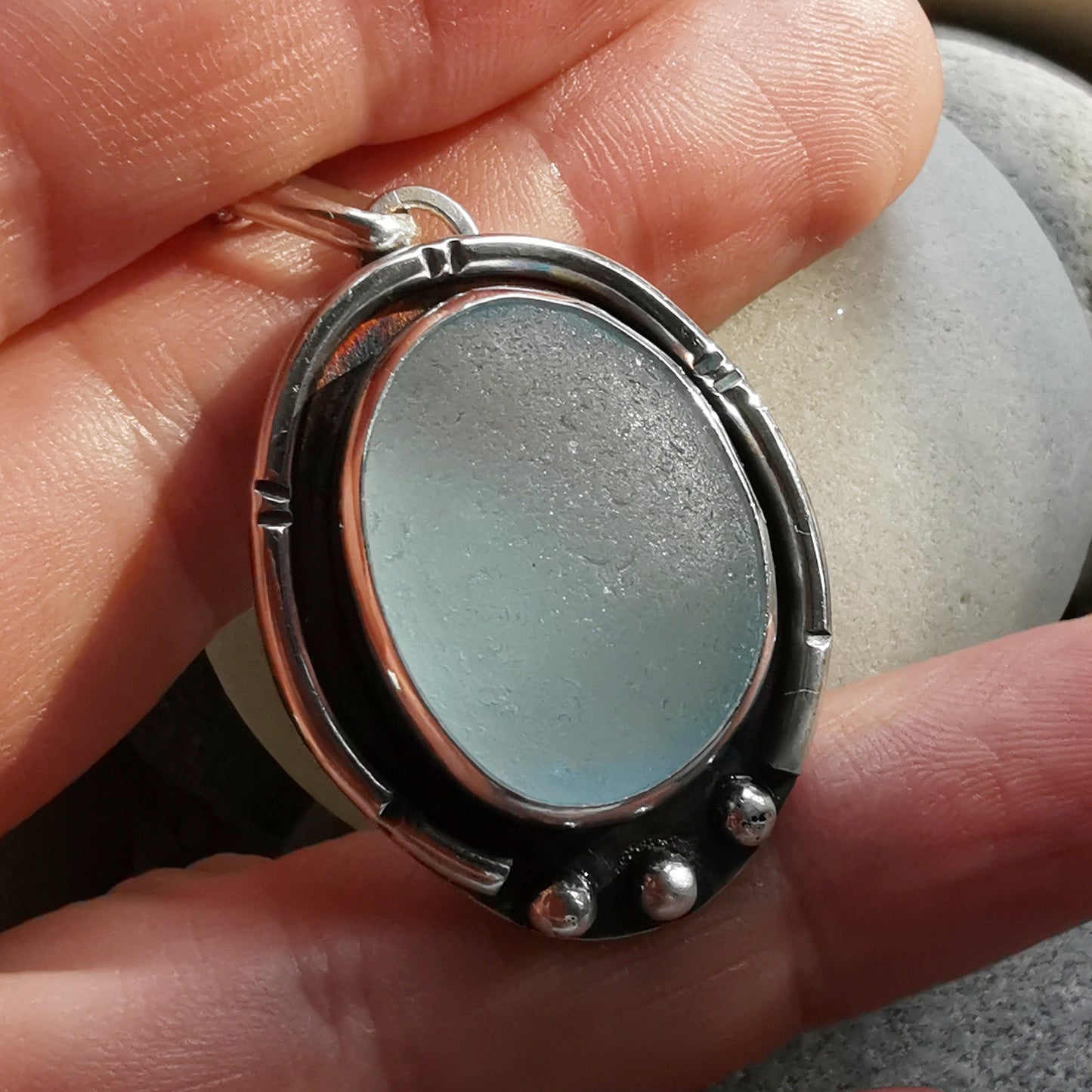 Scottish light blue sea glass & sterling silver pendant.