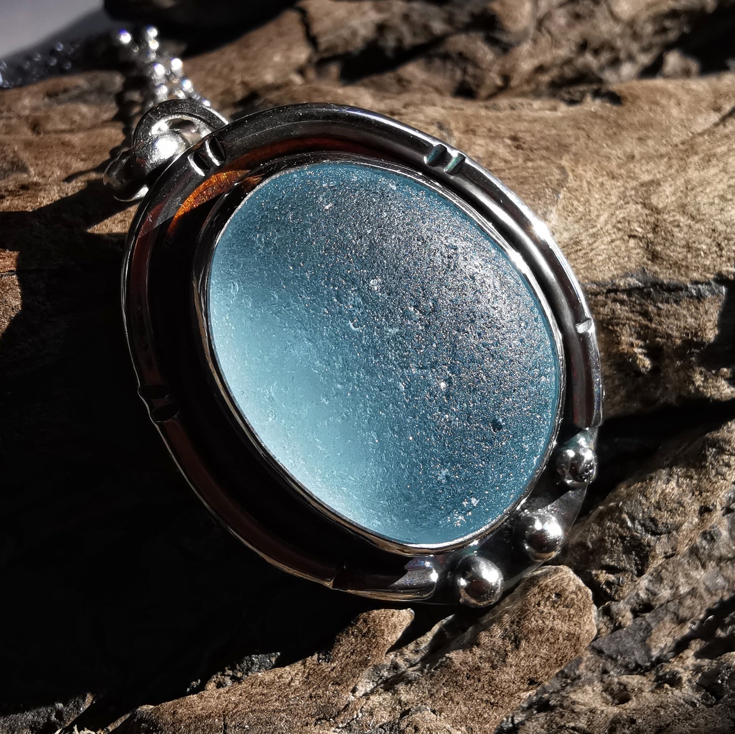 Scottish light blue sea glass & sterling silver pendant.