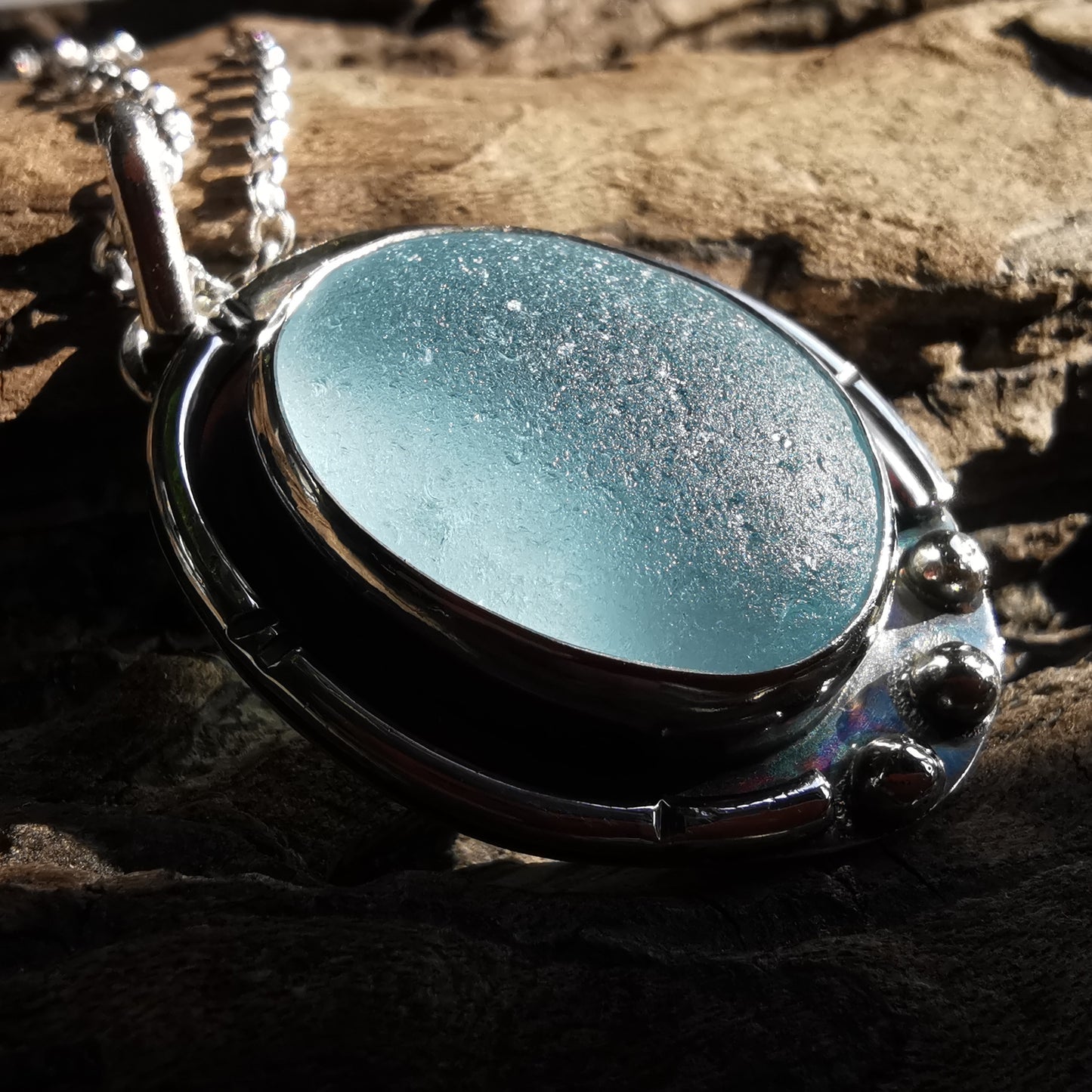 Scottish light blue sea glass & sterling silver pendant.