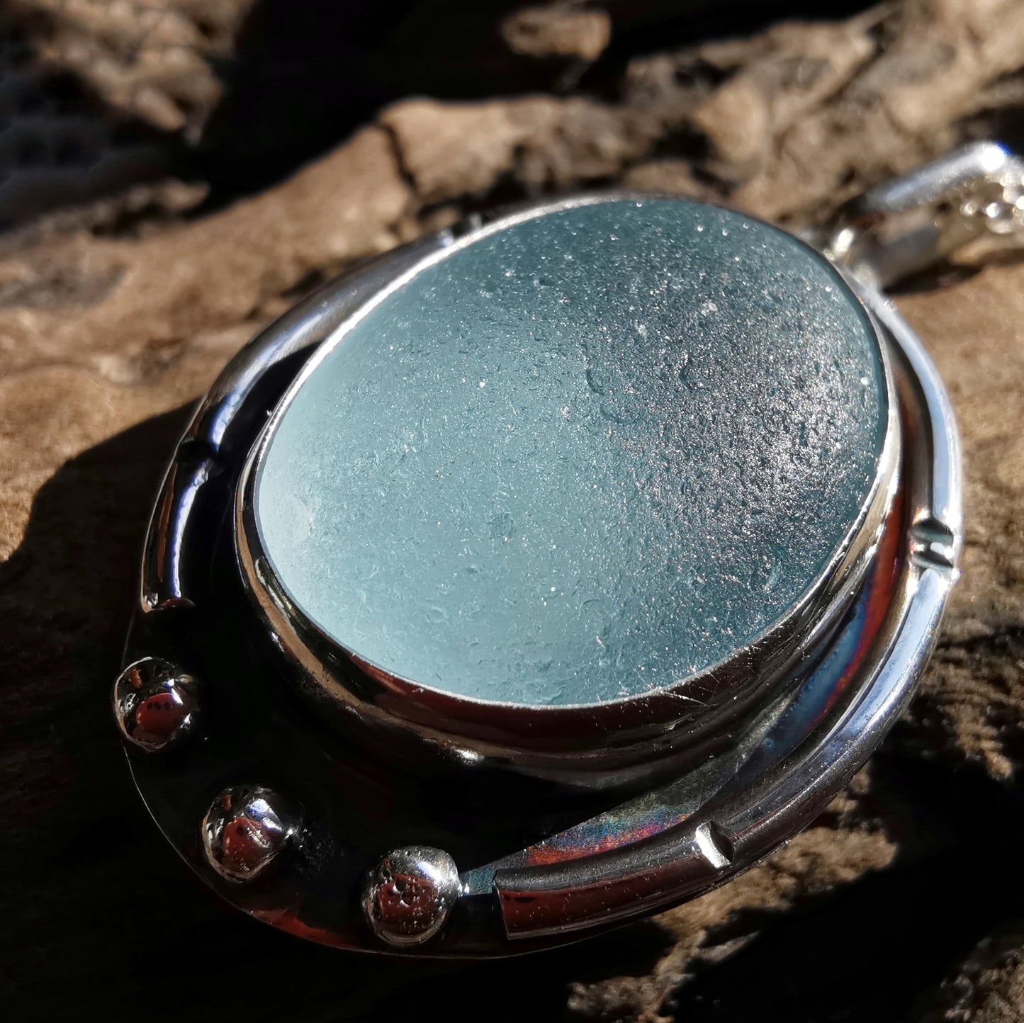 Scottish light blue sea glass & sterling silver pendant.
