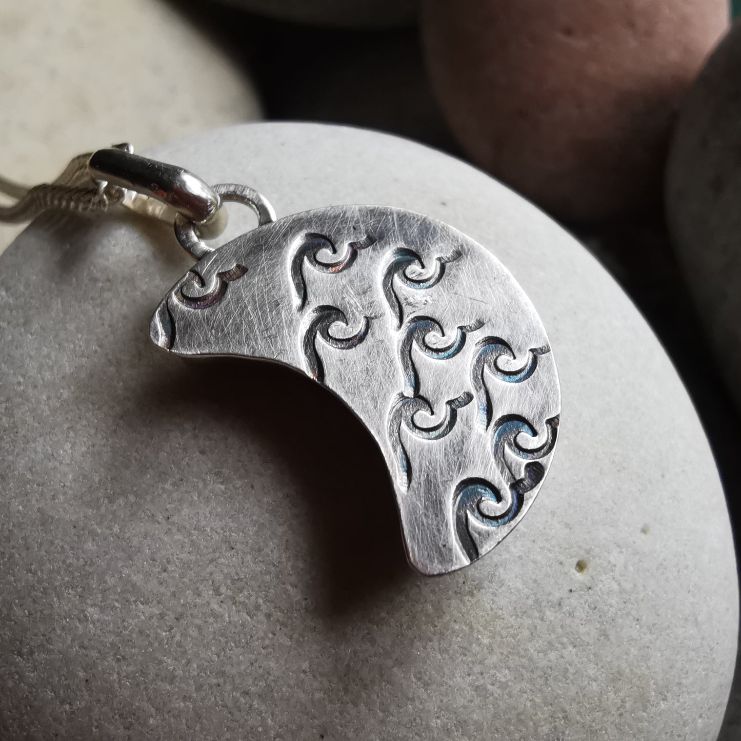 Purple crescent moon sea glass & sterling silver pendant.