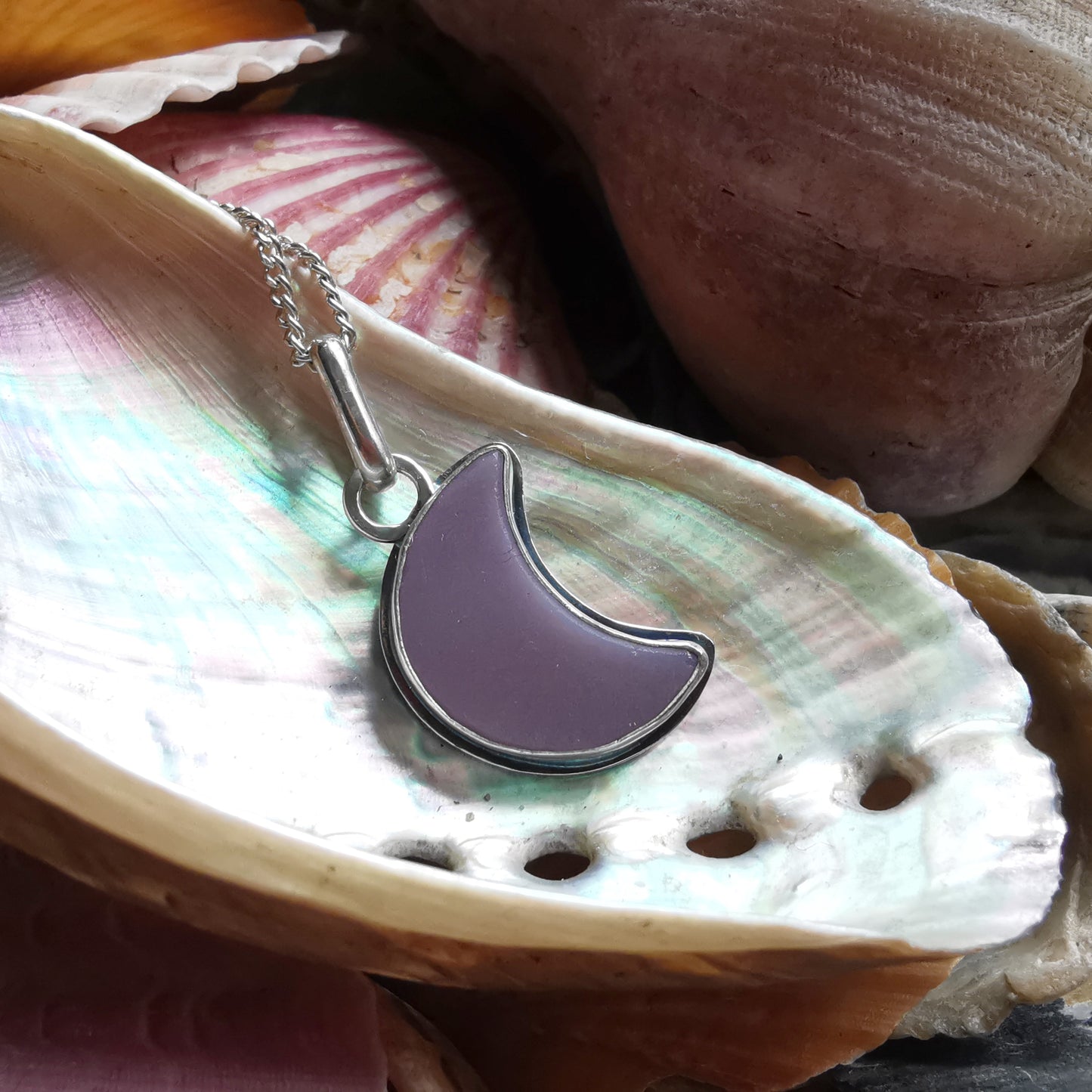 Purple crescent moon sea glass & sterling silver pendant.