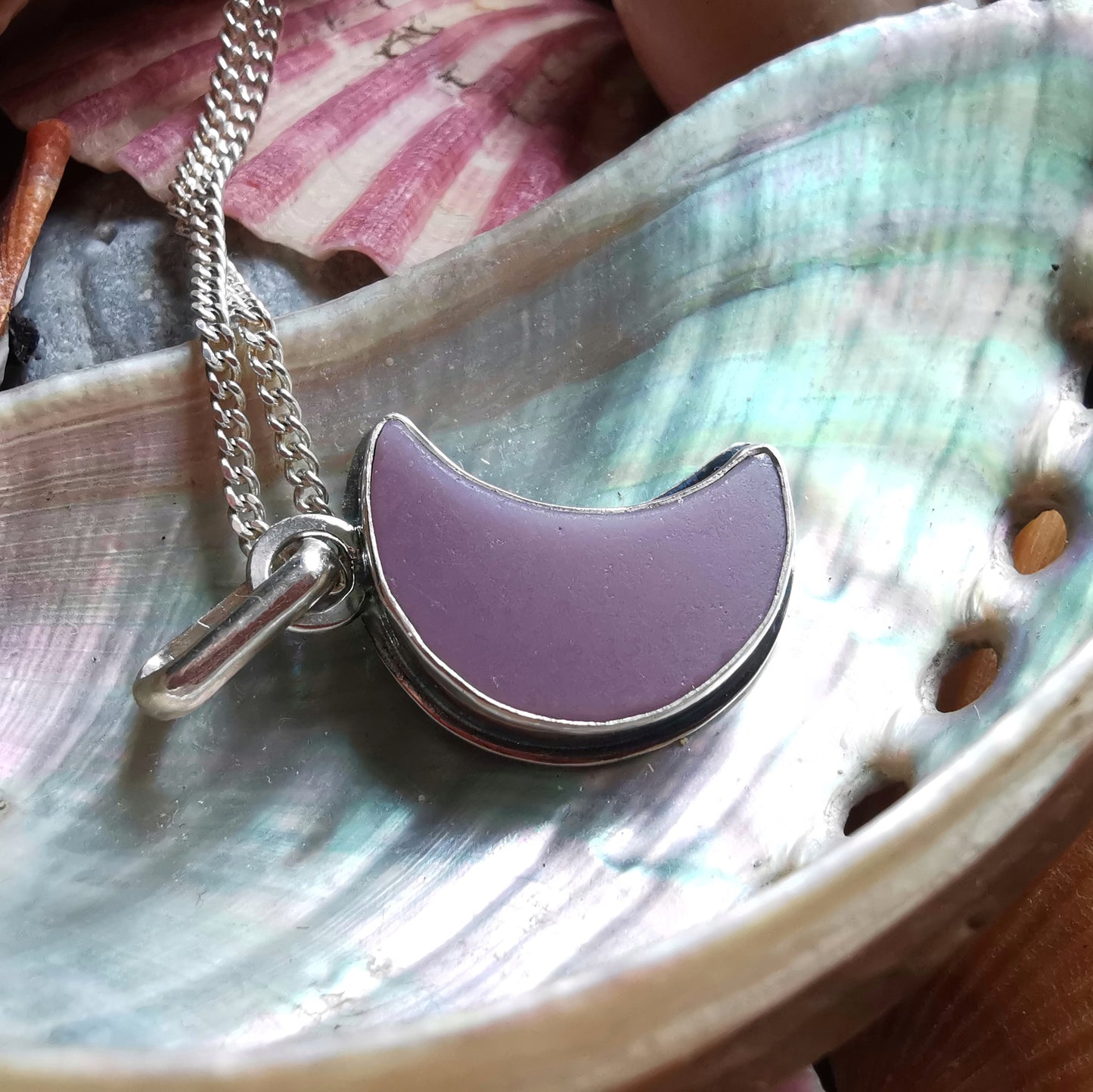 Purple crescent moon sea glass & sterling silver pendant.