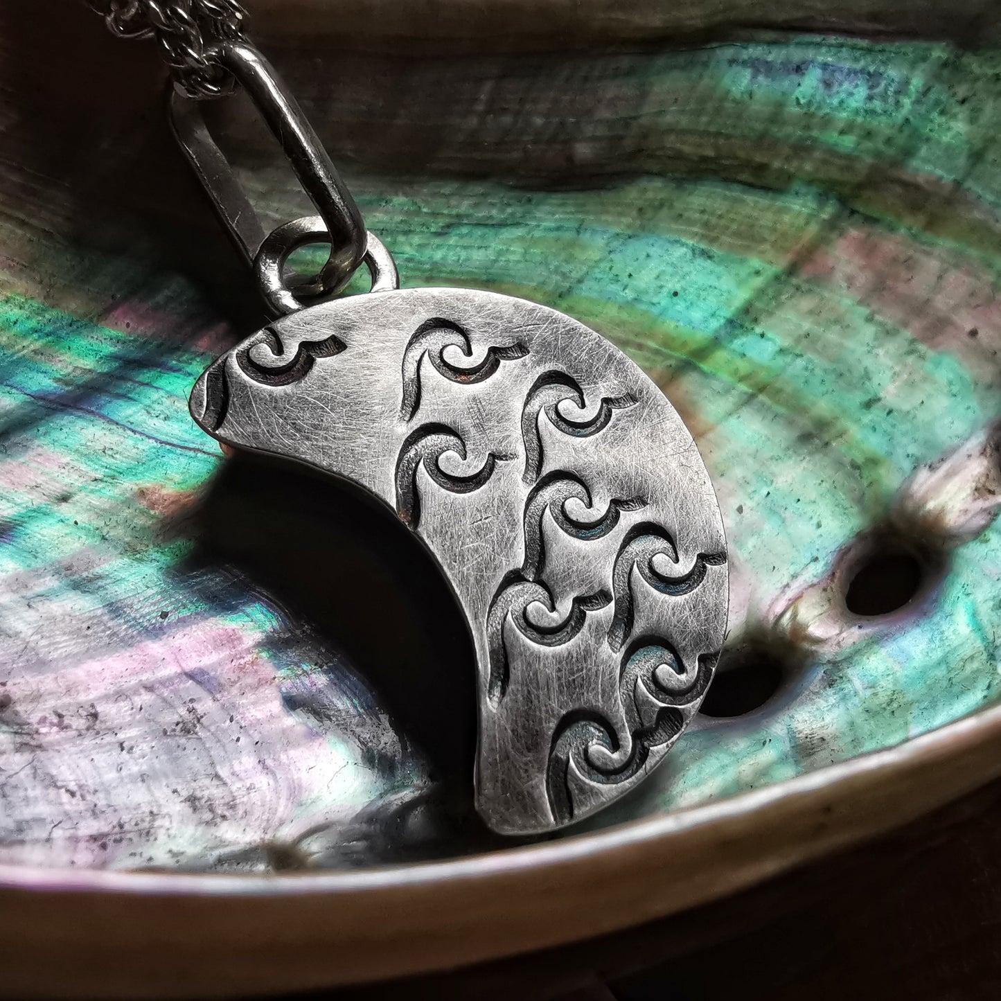 Purple crescent moon sea glass & sterling silver pendant.