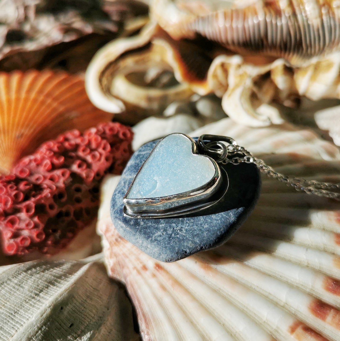 Reserved. Opalescent sea glass heart & sterling silver pendant.
