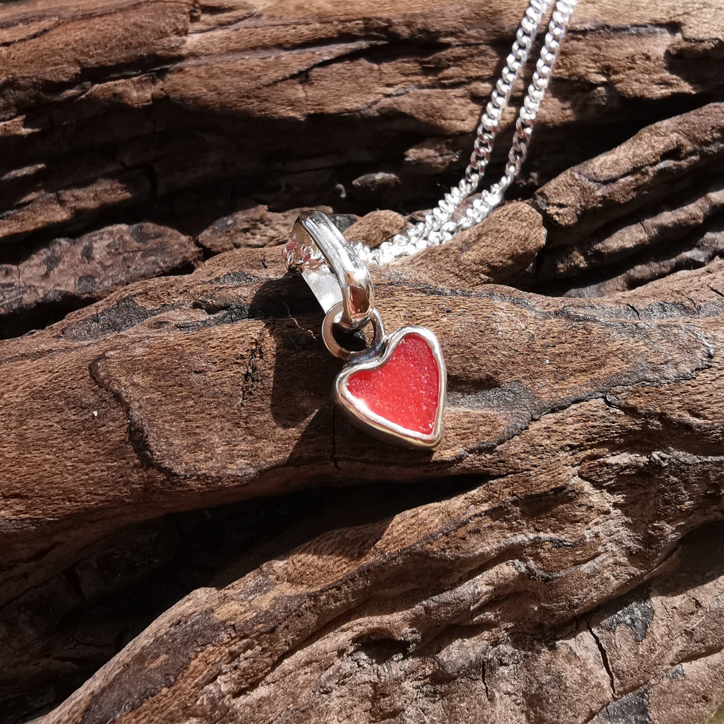 Tiny Scottish red sea glass heart & sterling silver pendant.