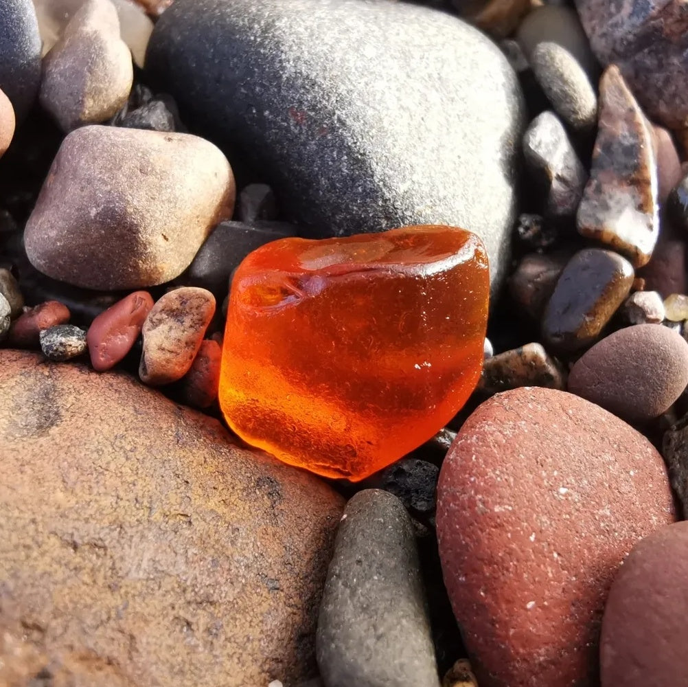 Scottish UV deep orange sea glass heart & sterling silver pendant.