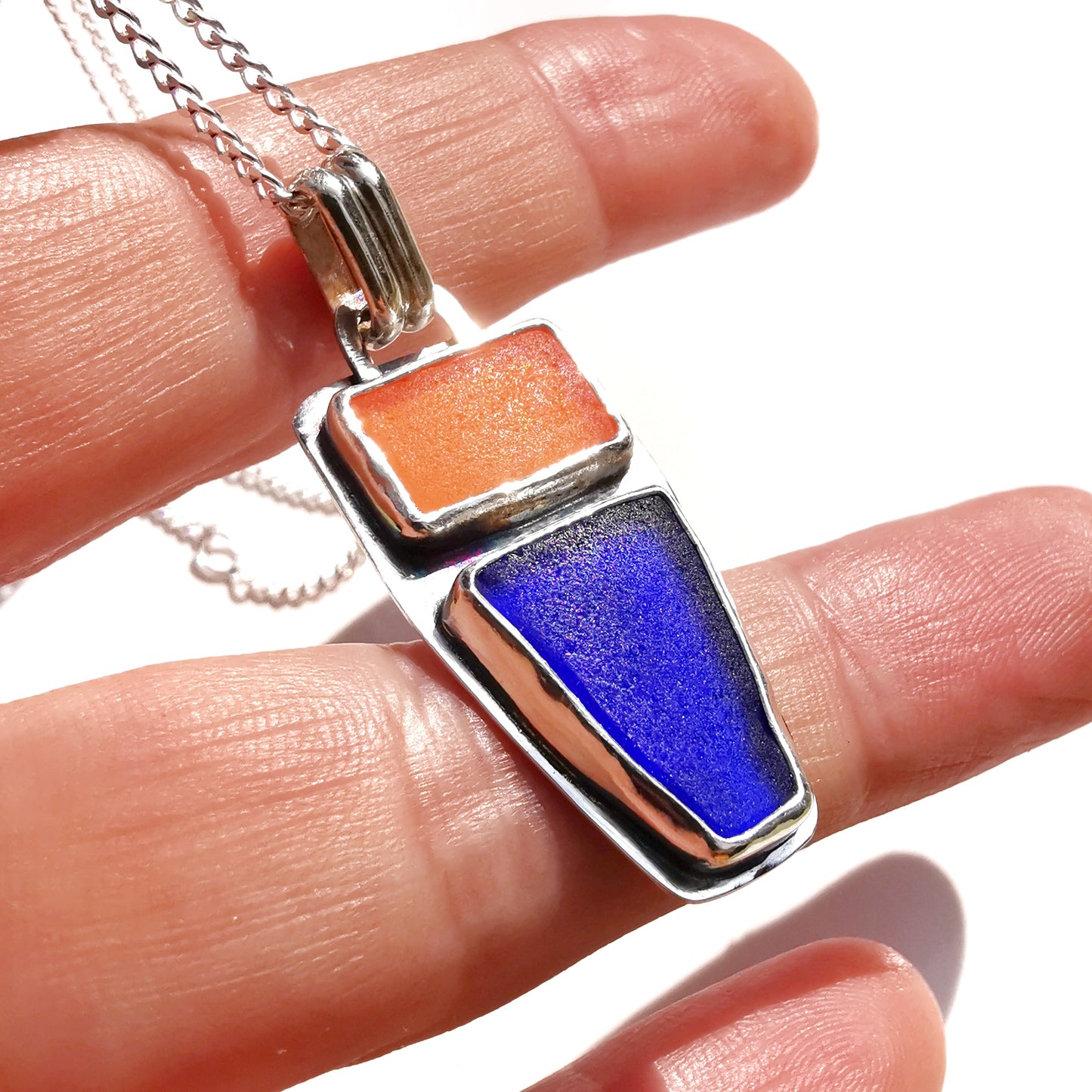 Scottish orange and blue sea glass & sterling silver pendant.